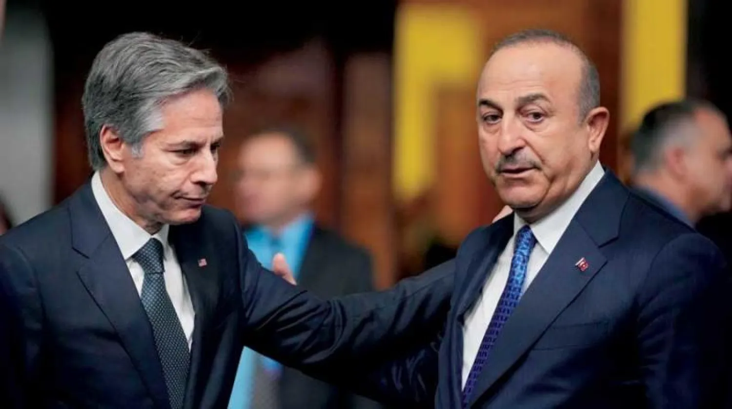 وزيرا خارجية تركيا وأميركا خلال اجتماع لـ «الناتو» في بوخارست في 29 نوفمبر 2022 (أ.ب)