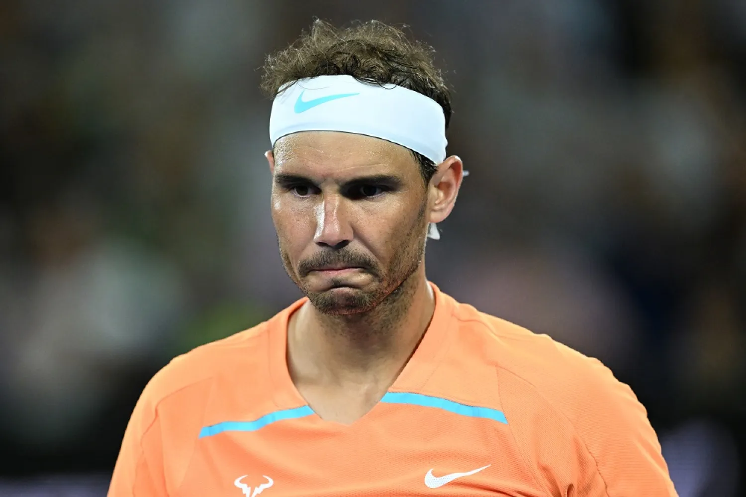 Rafael Nadal of Spain reacts while in action against Mackenzie McDonald of the USA during their match at the 2023 Australian Open tennis tournament at Melbourne Park in Melbourne, Australia, 18 January 2023. (EPA)
