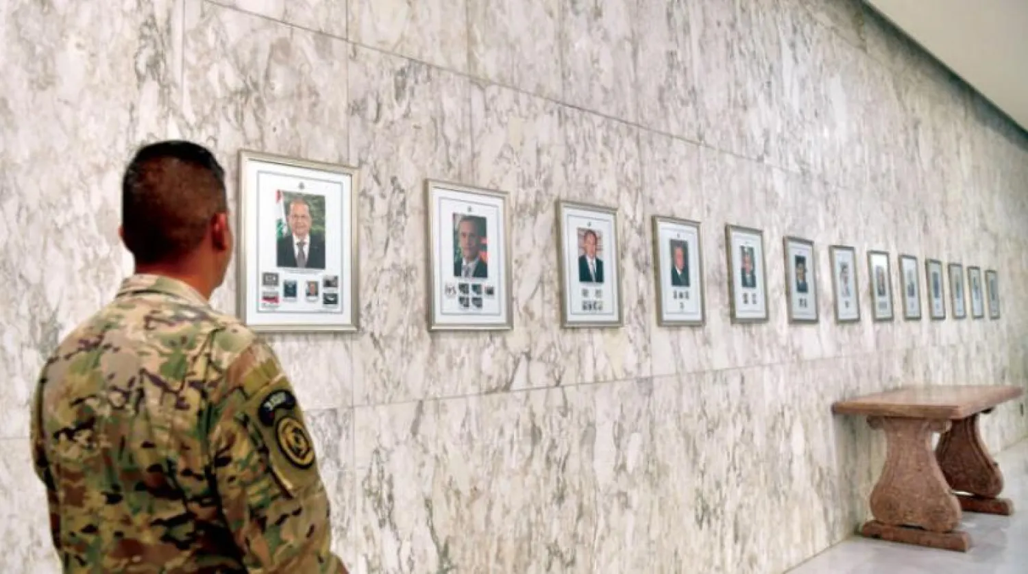 Pictures of former presidents in the presidential palace in Baabda, Lebanon (EPA)