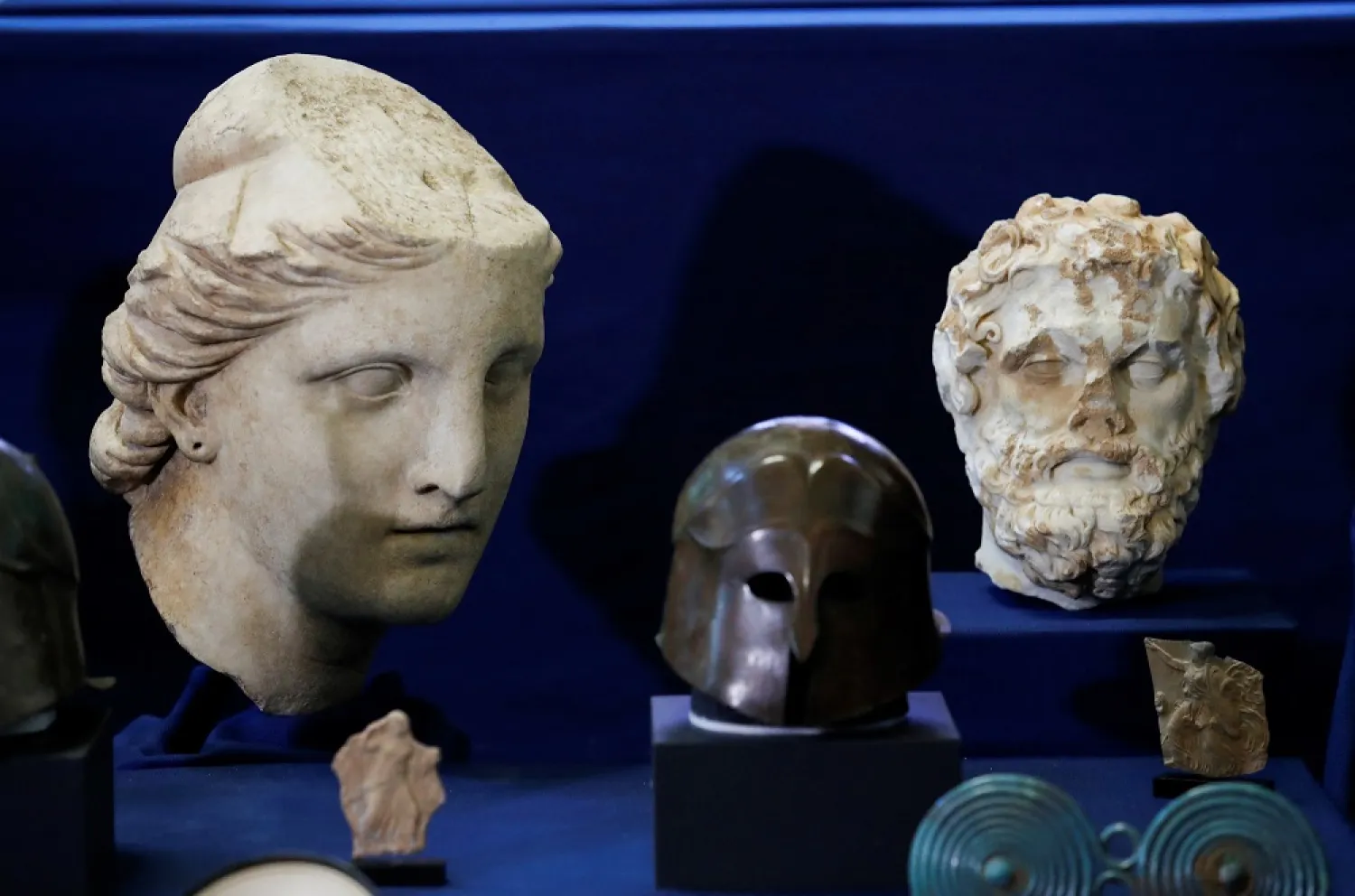 A marble head of Athena statue is seen among other antiquities worth an estimated $19 million that were returned to Italy by New York City, in Rome, Italy, January 23 2023. (Reuters)