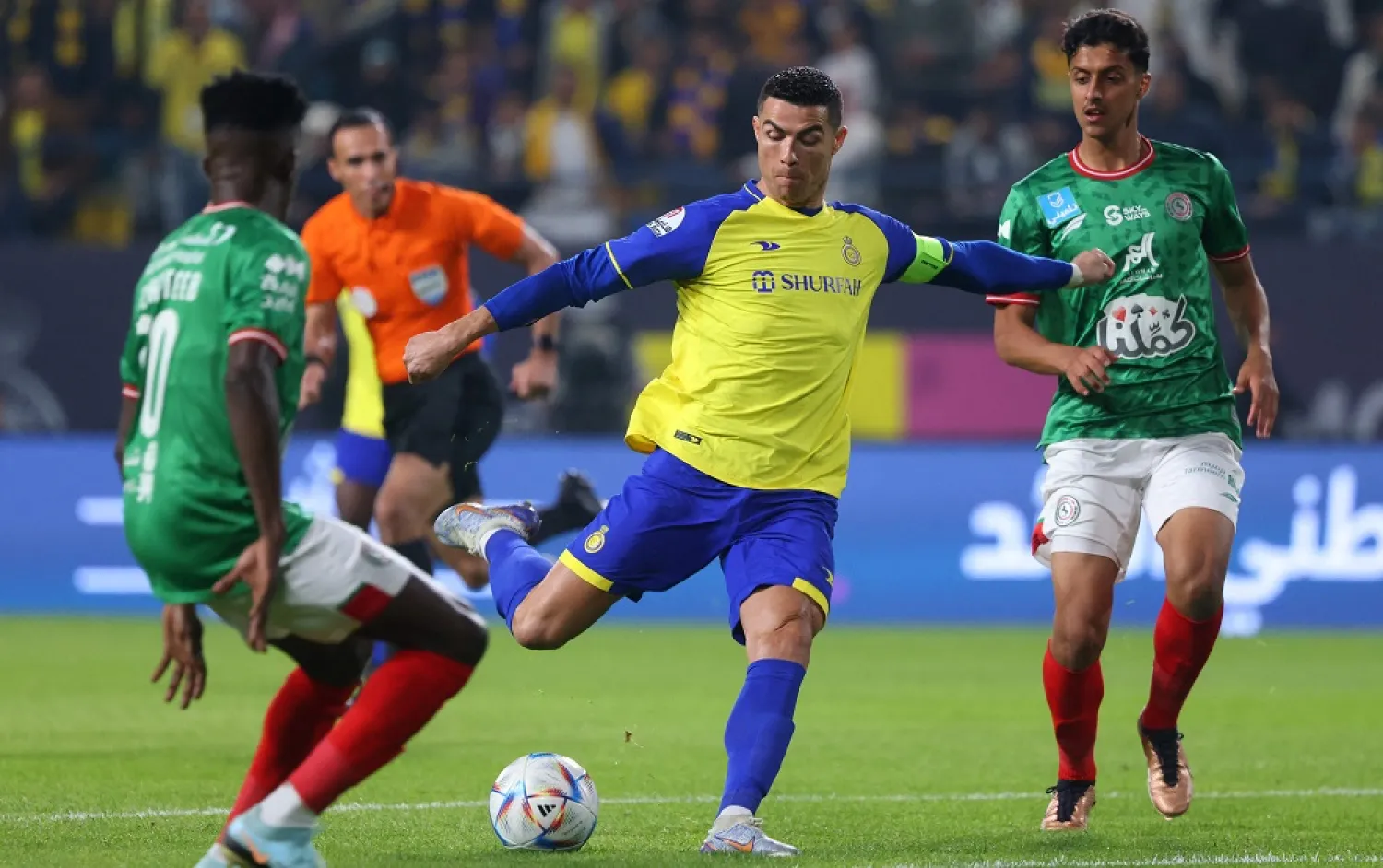 Al-Nassr's Portuguese forward Cristiano Ronaldo (C) attempts a shot during the Saudi Pro League football match between Al-Nassr and Al-Ettifaq at the King Fahd Stadium in the Saudi capital Riyadh on January 22, 2023. (AFP)
