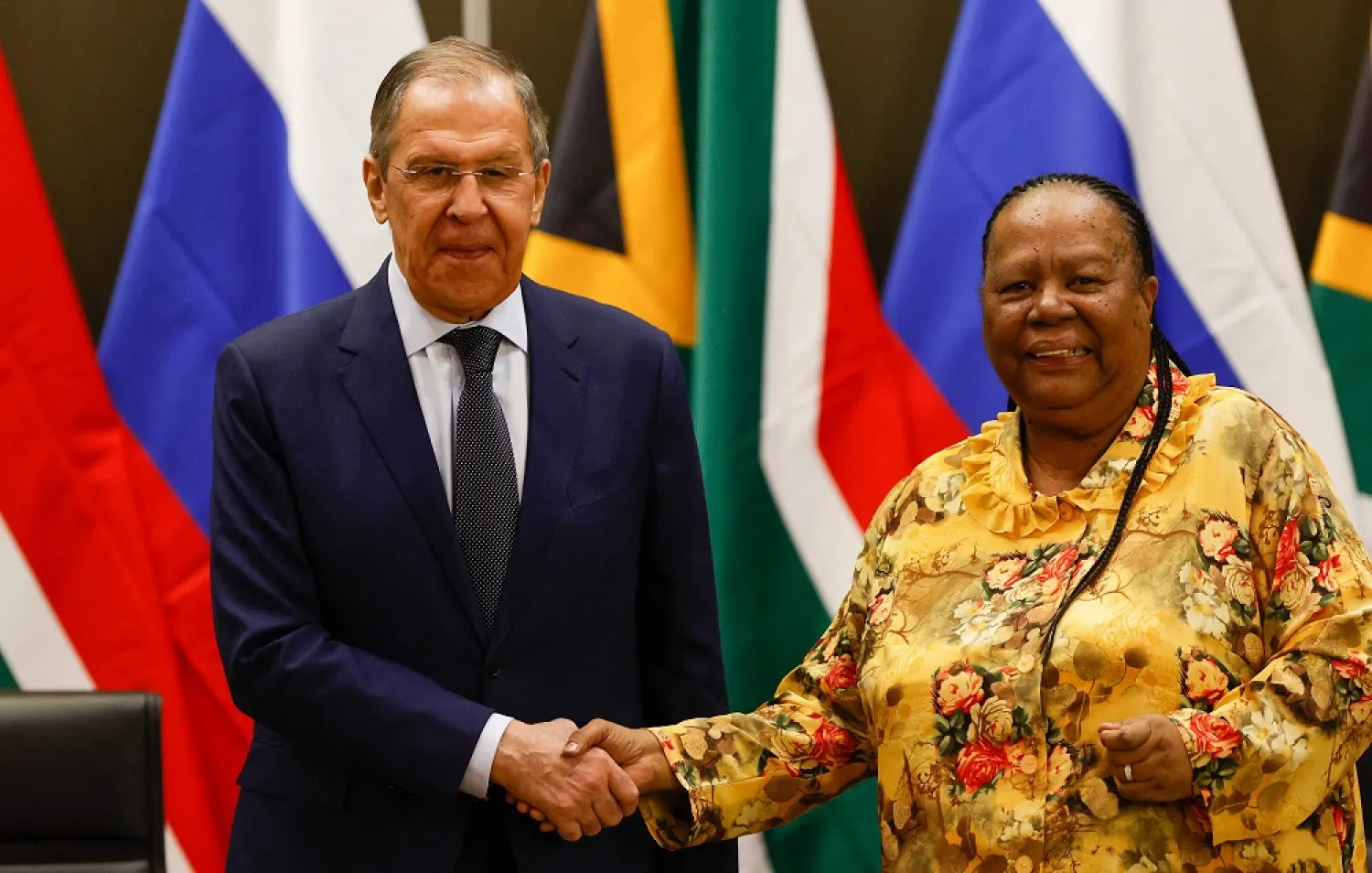 Russian Minister of Foreign Affairs of Sergei Lavrov (L) shakes hands with South African Minister of International Relations and Cooperation Naledi Pandor (R) during a press conference following their meeting at the OR Tambo Building in Pretoria on January 23, 2023. (AFP)
