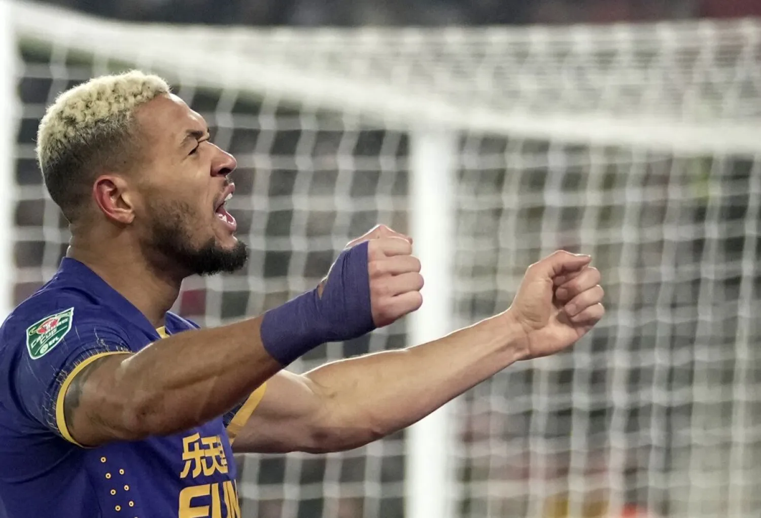 Newcastle's Joelinton celebrates after scoring his side's opening goal during the EFL Cup semifinal, first leg soccer match between Southampton and Newcastle United at St Mary's Stadium in Southampton, England, Tuesday, Jan. 24, 2023. (AP Photo/Kin Cheung)
