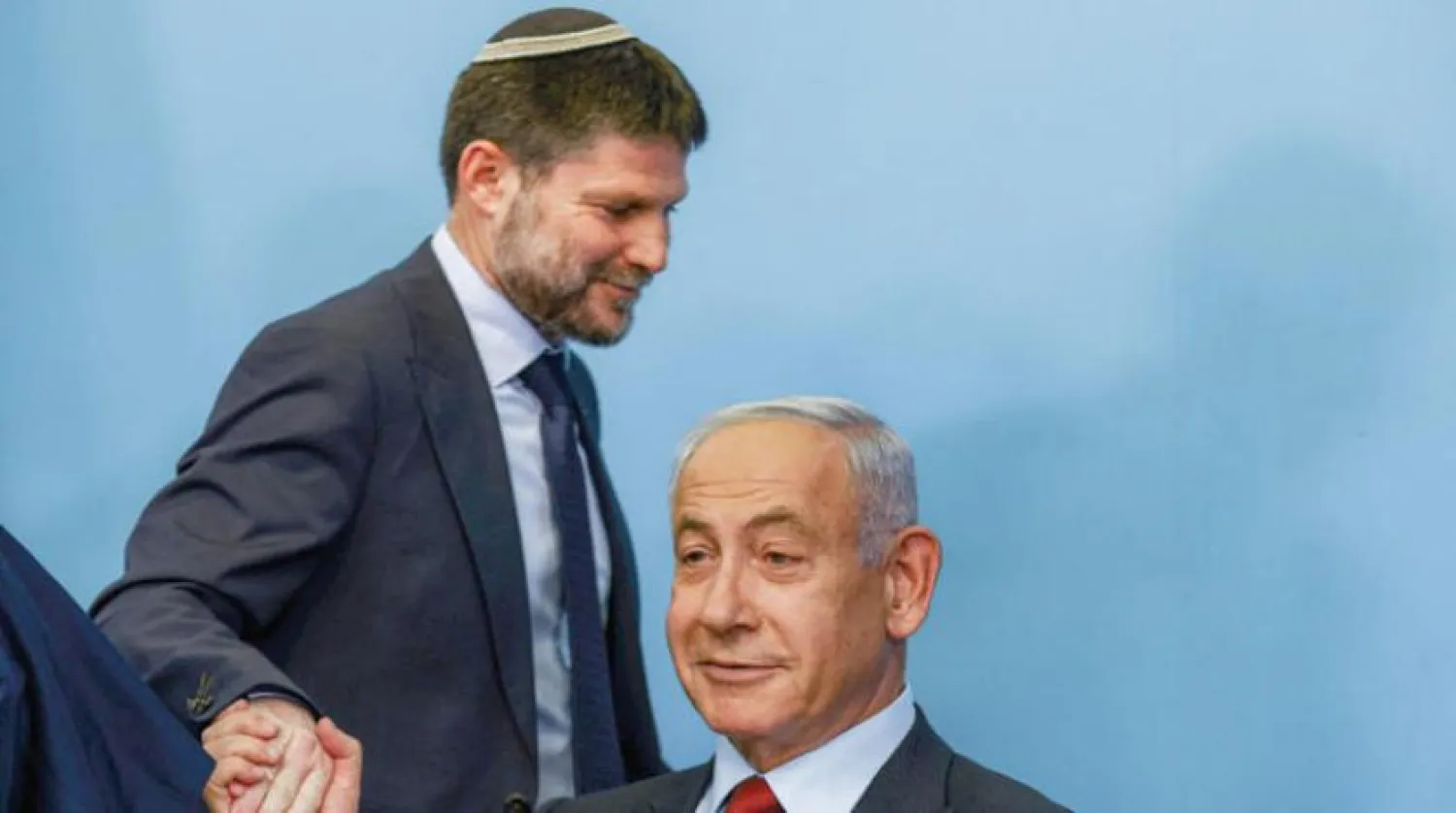 Netanyahu ve Maliye Bakanı Bezalel Smotrich. (AFP)