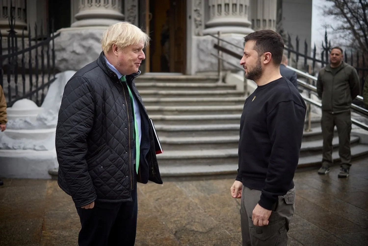 Ukraine's President Volodymyr Zelensky welcomes former British Prime Minister Boris Johnson, amid Russia's attack on Ukraine, in Kyiv, Ukraine January 22, 2023. (Ukrainian Presidential Press Service/Handout via Reuters)
