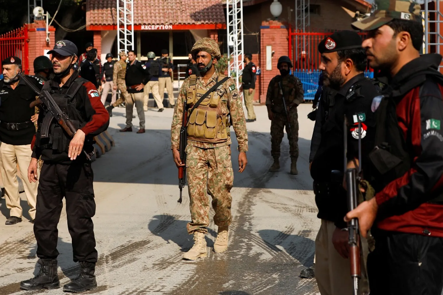 Military soldiers and police officers stand guard, after a suicide blast in a mosque in Peshawar, Pakistan January 30, 2023. (Reuters)