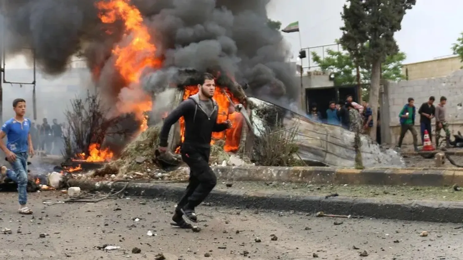 Fire billows from a burning vehicle following a reported car bomb explosion in the opposition-held town of Azaz in northern Syria on May 3, 2017. (AFP)