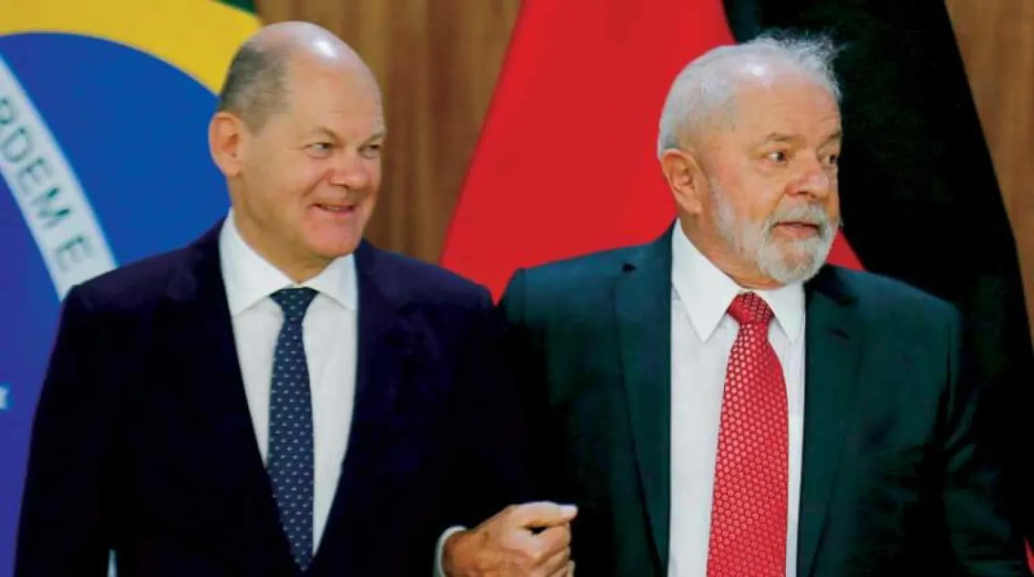 لولا وشولتس في مؤتمر صحافي بالقصر الرئاسي في برازيليا أول من أمس (أ.ف.ب)