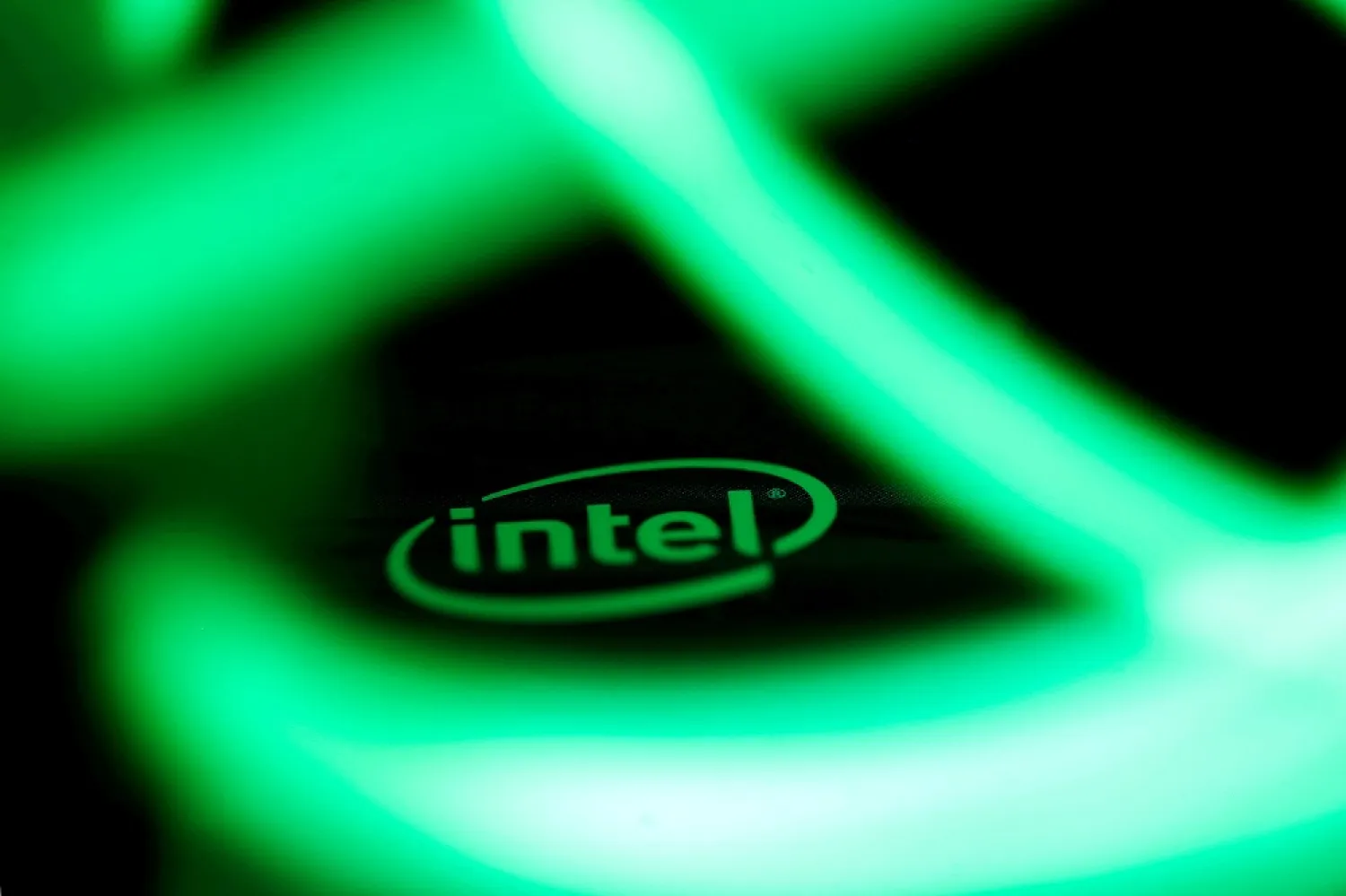 The Intel logo is seen behind LED lights in this illustration taken January 5, 2018. (Reuters)