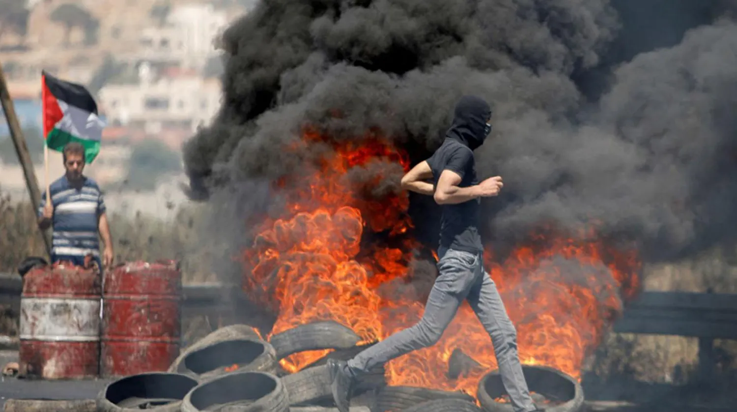 Birleşik Krallık merkezli Af Örgütü, geçen yılki raporunda İsrail'in Filistinlilere yönelik ayrımcı ve ırkçı politikasını insanlık suçu diye nitelemişti (Reuters)