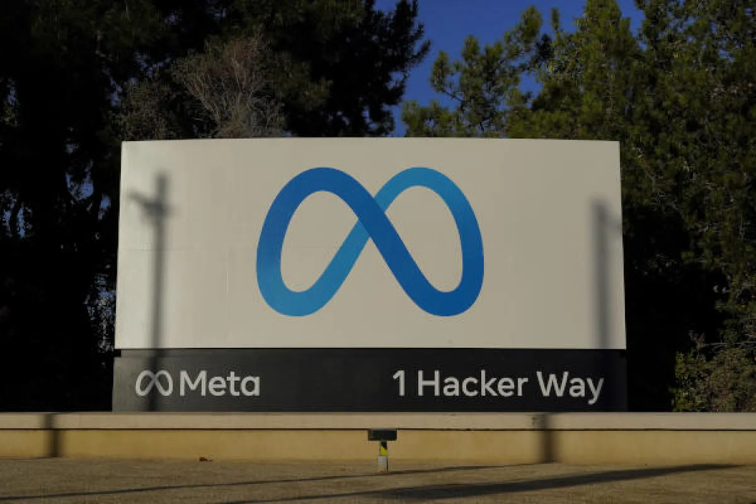 FILE - Meta's logo can be seen on a sign at the company's headquarters in Menlo Park, Calif., on Nov. 9, 2022. Meta reports their earnings on Wednesday, Feb. 1, 2023. (AP Photo/Godofredo A. Va¡squez, File)
