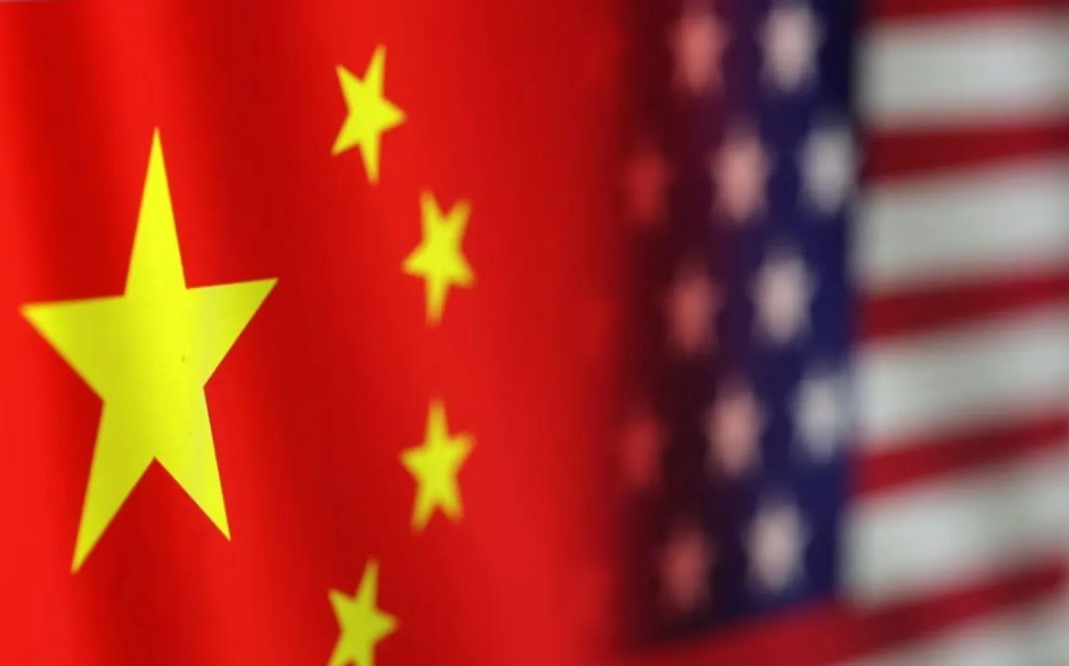 US and Chinese flags are seen in this illustration taken, January 30, 2023. REUTERS/Dado Ruvic/Illustration
