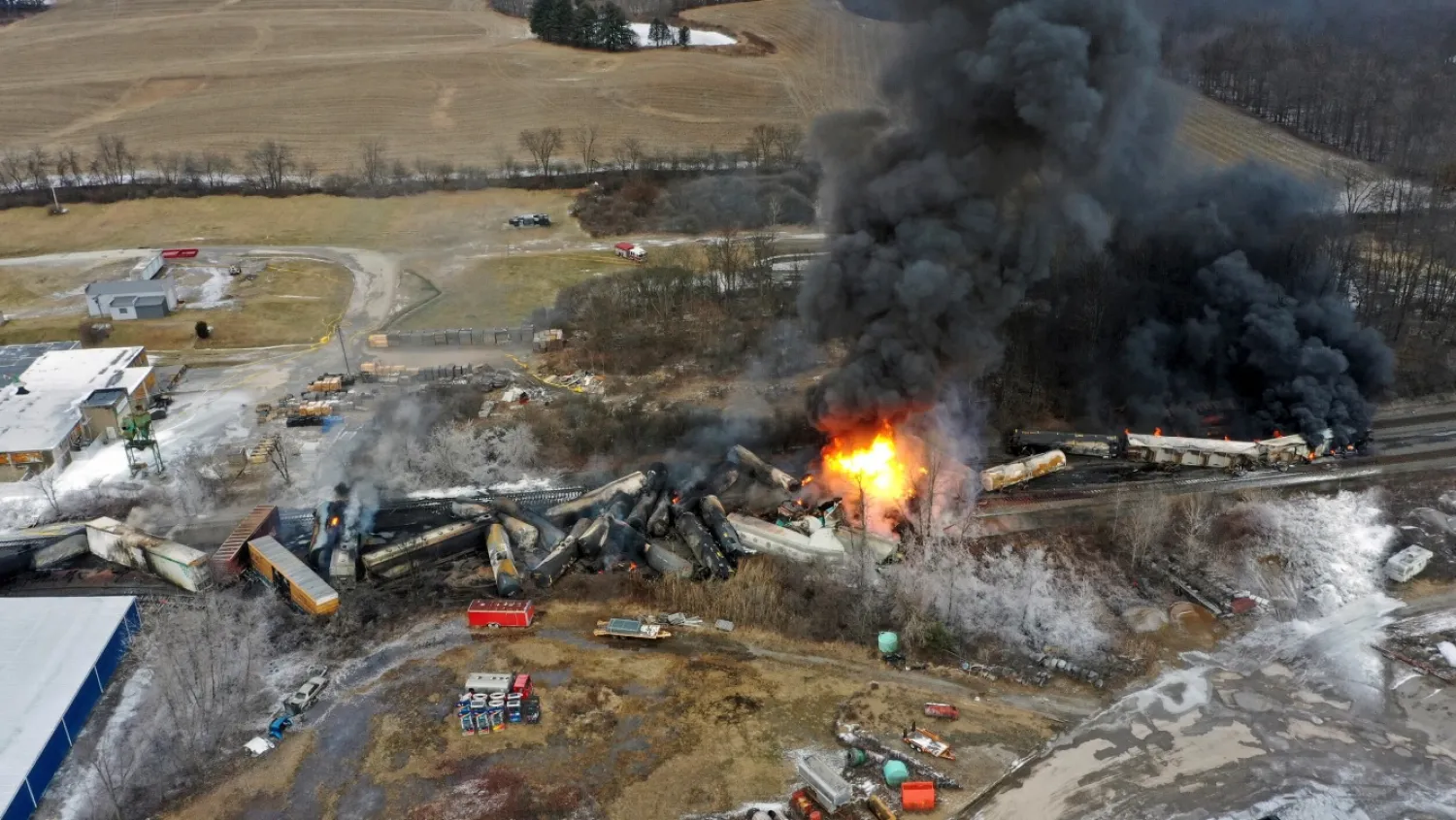 This photo taken with a drone shows portions of a Norfolk and Southern freight train that derailed Friday night in East Palestine, Ohio are still on fire at mid-day Saturday, Feb. 4, 2023. (AP Photo/Gene J. Puskar)