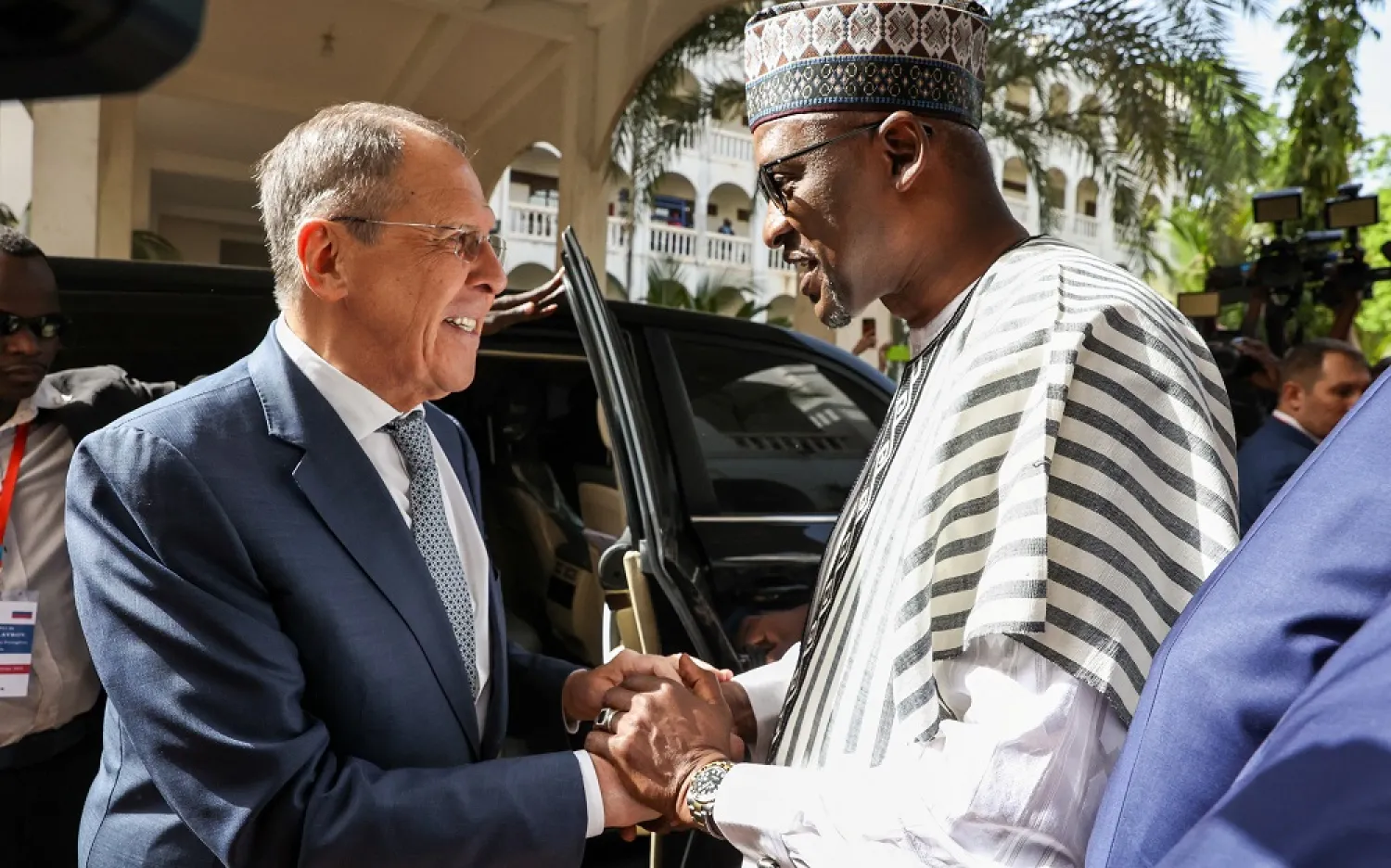 Russian Foreign Minister Sergei Lavrov is welcomed by his Malian counterpart Abdoulaye Diop before their talks in Bamako, Mali, February 7, 2023. (Russian Foreign Ministry/Handout via Reuters)