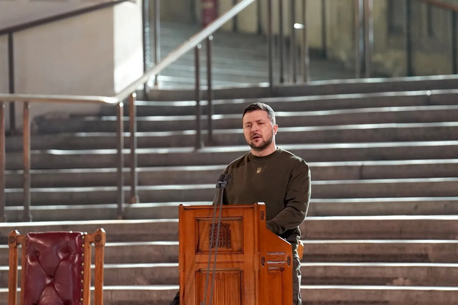 Ukrainian President Volodymyr Zelenskiy addresses parliamentarians during his first visit to the UK since the Russian invasion of Ukraine in Westminster Hall, London, Britain, February 8, 2023. (Reuters)