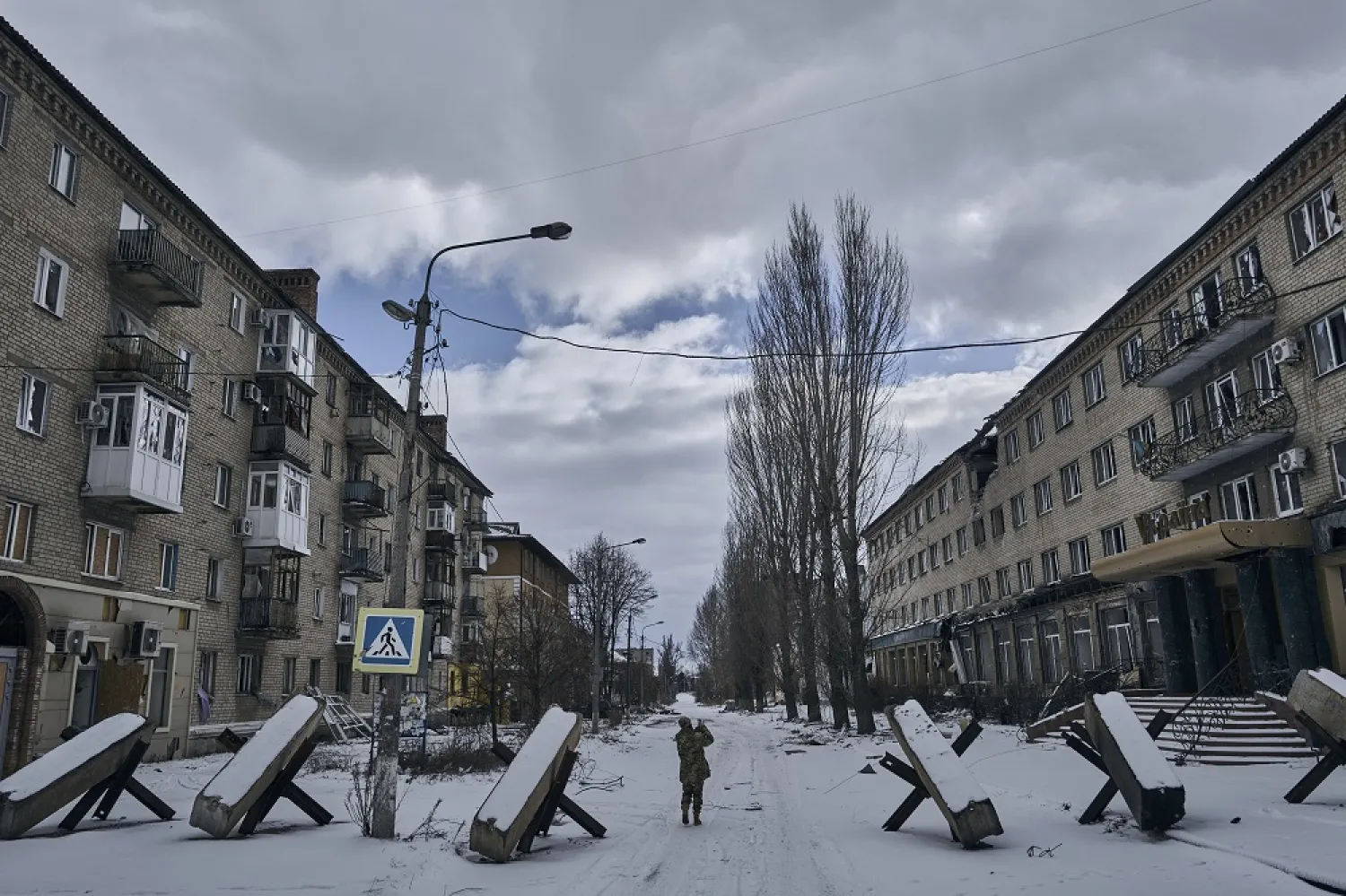 A Ukrainian soldier walks along a street in Bakhmut, Donetsk region, Ukraine, Sunday, Feb. 12, 2023. (AP)