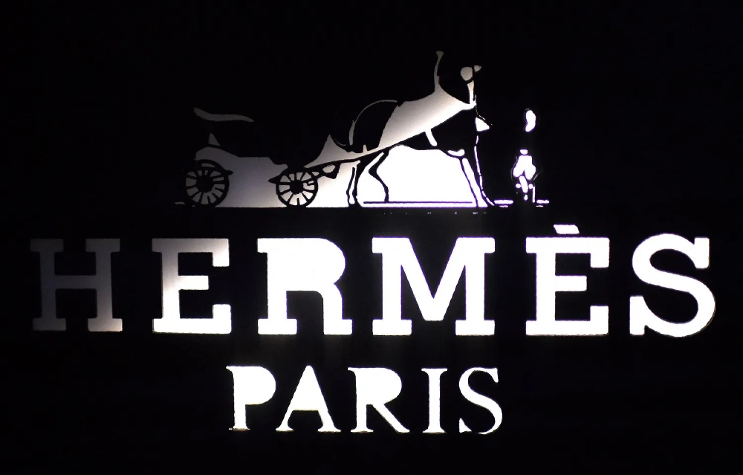 This file photograph taken on December 20, 2017, shows the logo of the French fashion house and luxury goods manufacturer Hermes, in the fashionable and luxurious street "Rue du Faubourg Saint-Honore" in Paris. (AFP)
