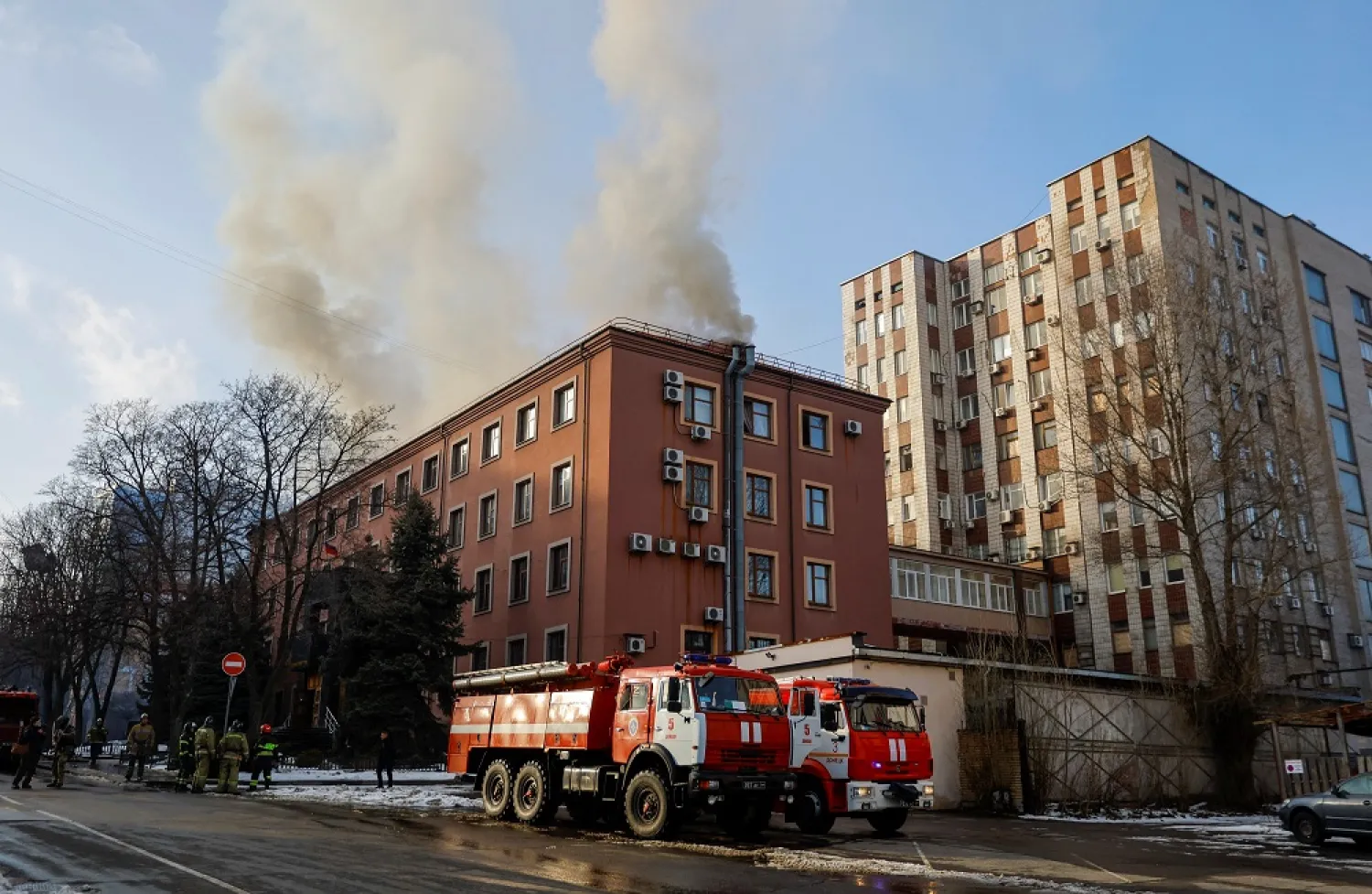 Smoke rises above a building of the prosecutor's office damaged in shelling in the course of Russia-Ukraine conflict in Donetsk, Russian-controlled Ukraine, February 19, 2023. (Reuters)