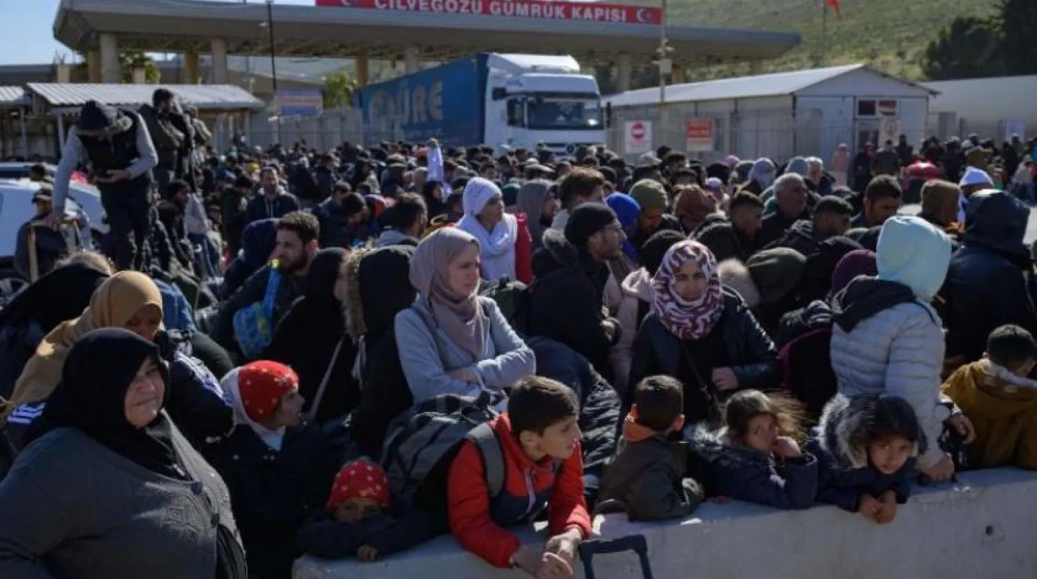 Syrians in Türkiye waiting to cross through Bab al-Hawa to Syria (AFP)
