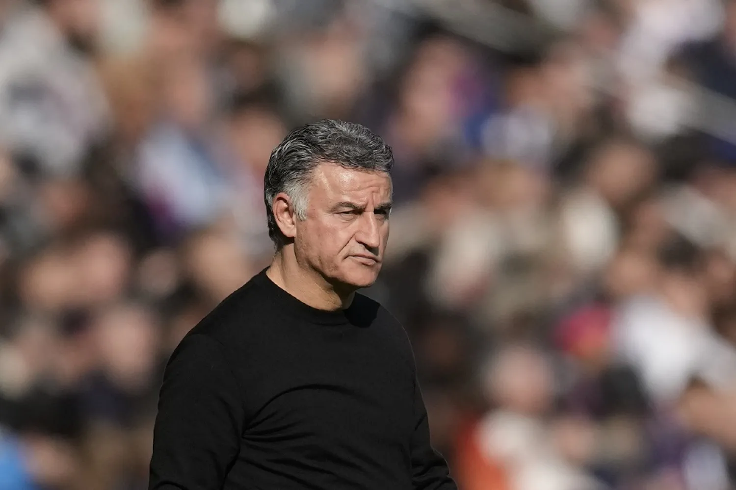 PSG coach Christophe Galtier stands during the French Ligue 1 match between PSG and Lille at the Parc des Princes stadium, in Paris, France, Sunday, Feb. 19, 2023. (AP)