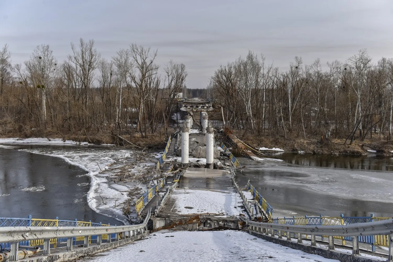 A destroyed bridge over the Siversky Donets River in Bohorodychne, Donetsk region, eastern Ukraine, 24 February 2023. (EPA)