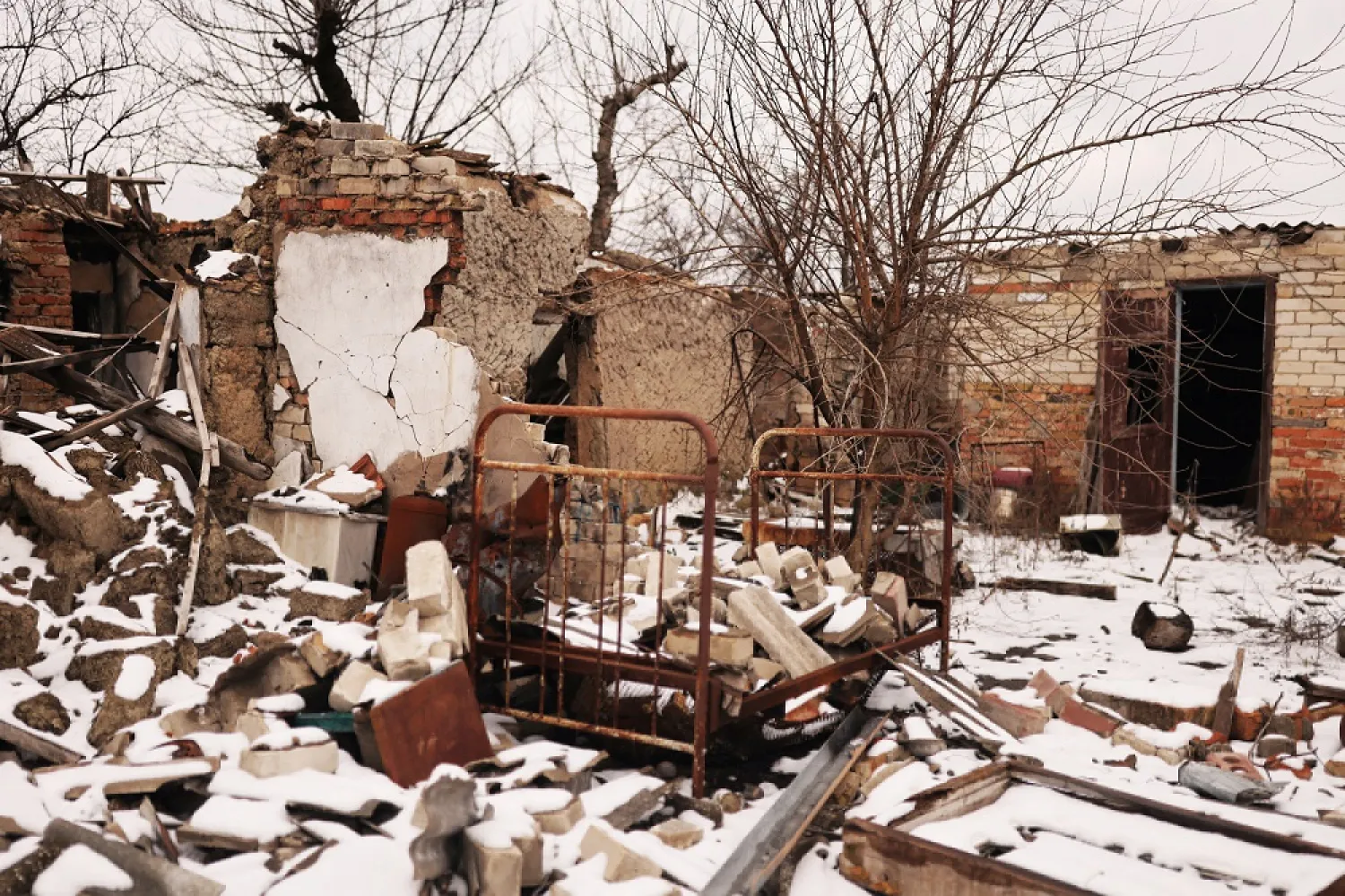 A bed is pictured in a house destroyed during the months of Russian occupation in the village of Posad-Pokrovske, amid Russia's invasion of Ukraine, northwest of the city of Kherson, Ukraine January 30, 2023. (Reuters)
