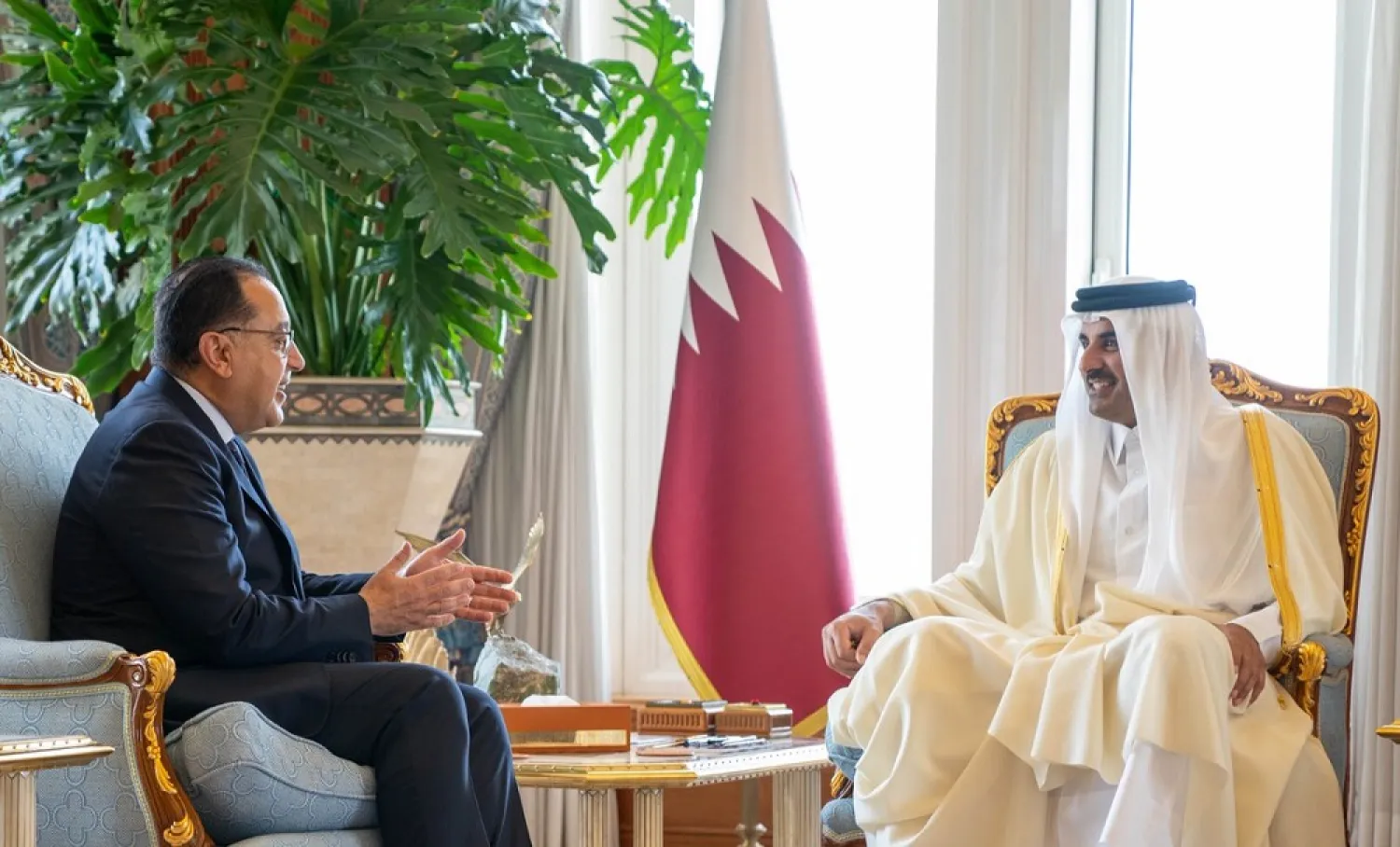 Emir of Qatar Sheikh Tamim bin Hamad Al-Thani meets with Egyptian Prime Minister Mostafa Madbouly in Doha on Monday. (QNA)