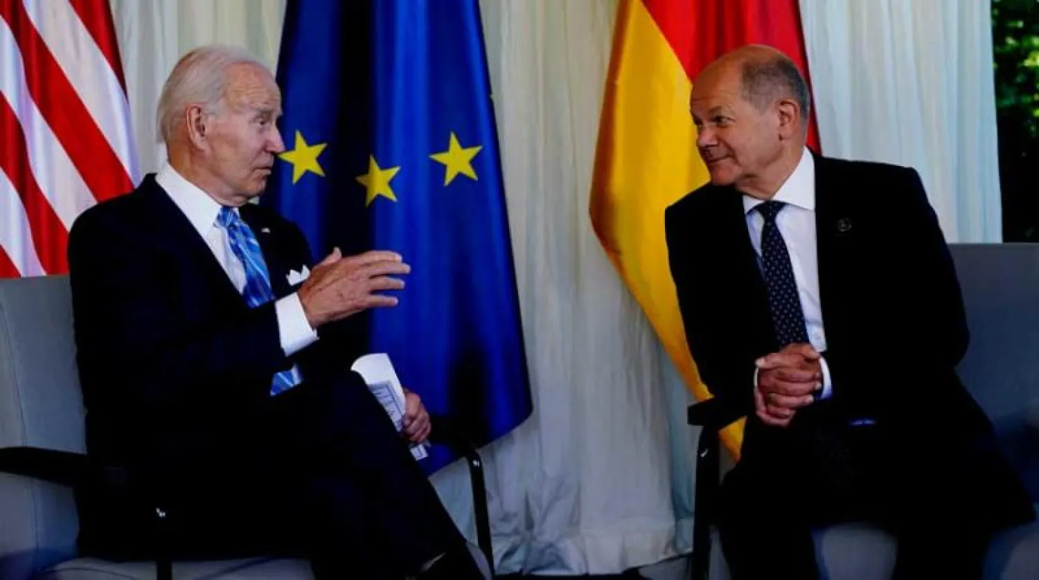 شولتز وبايدن في لقاء سابق يونيو 2022 (أ.ب)