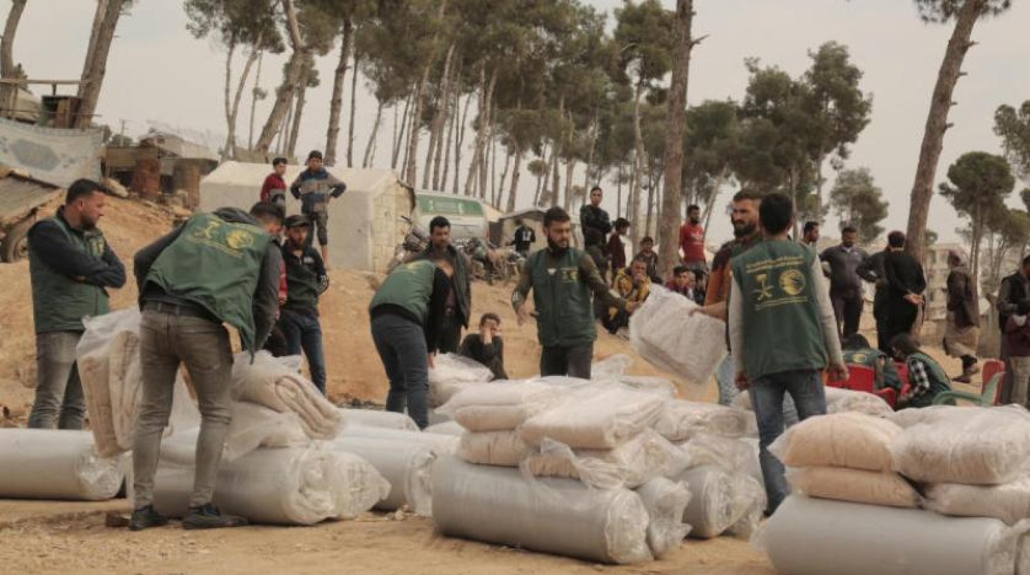 Aid, provided by KSrelief, is distributed in Syria's Jindires. (Asharq Al-Awsat)