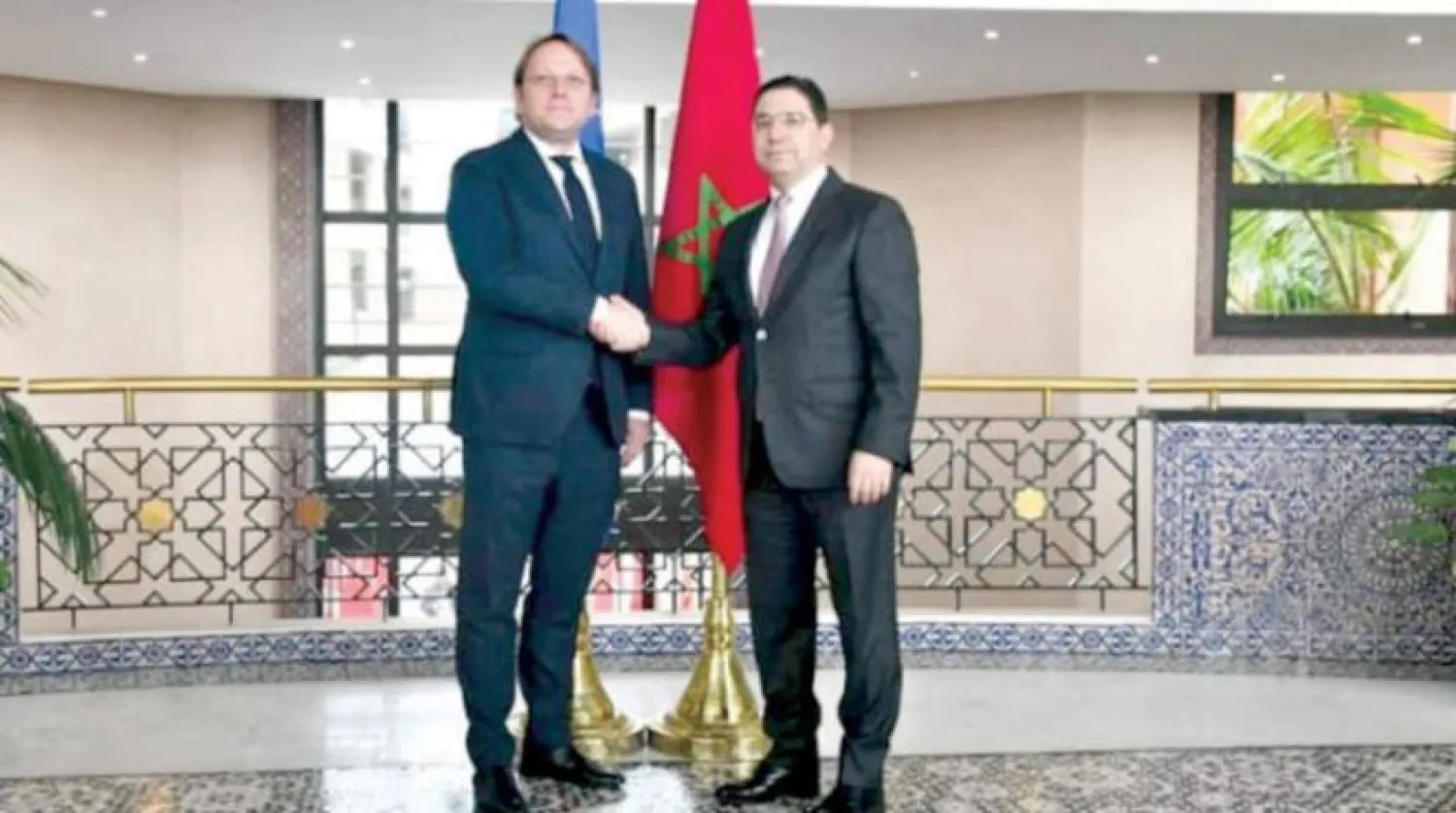 Bourita receives Oliver Varhelyi in Rabat on Thursday. (Asharq Al-Awsat)