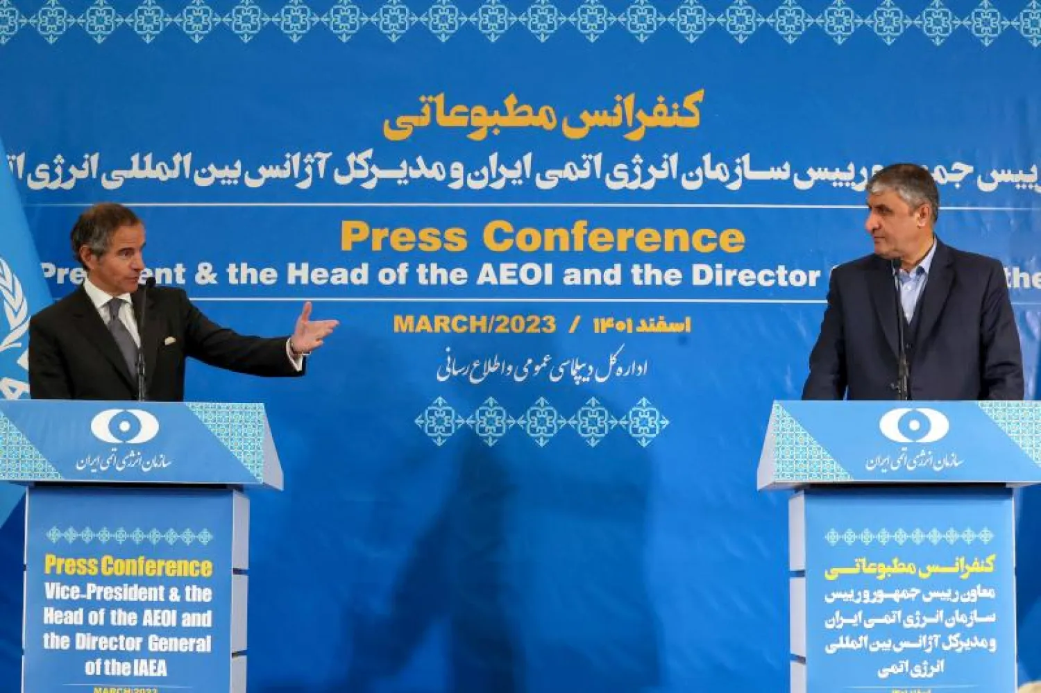 غروسي وإسلامي خلال مؤتمر صحافي في طهران (أ.ف.ب)