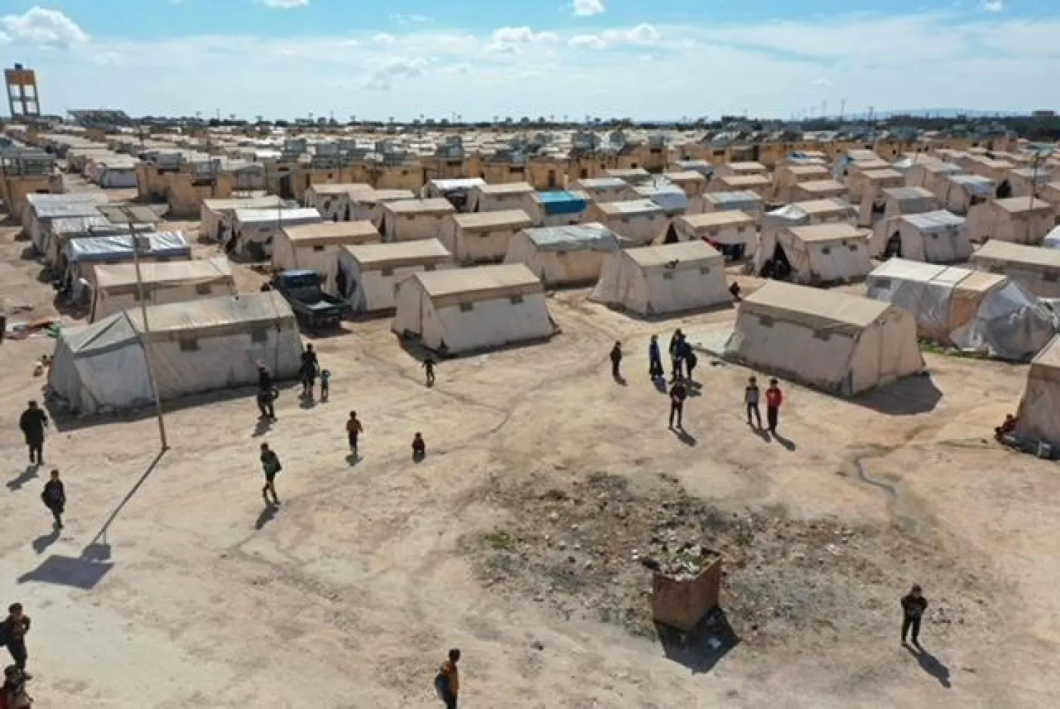 أحد مخيمات النزوح السوري (أ.ف.ب)