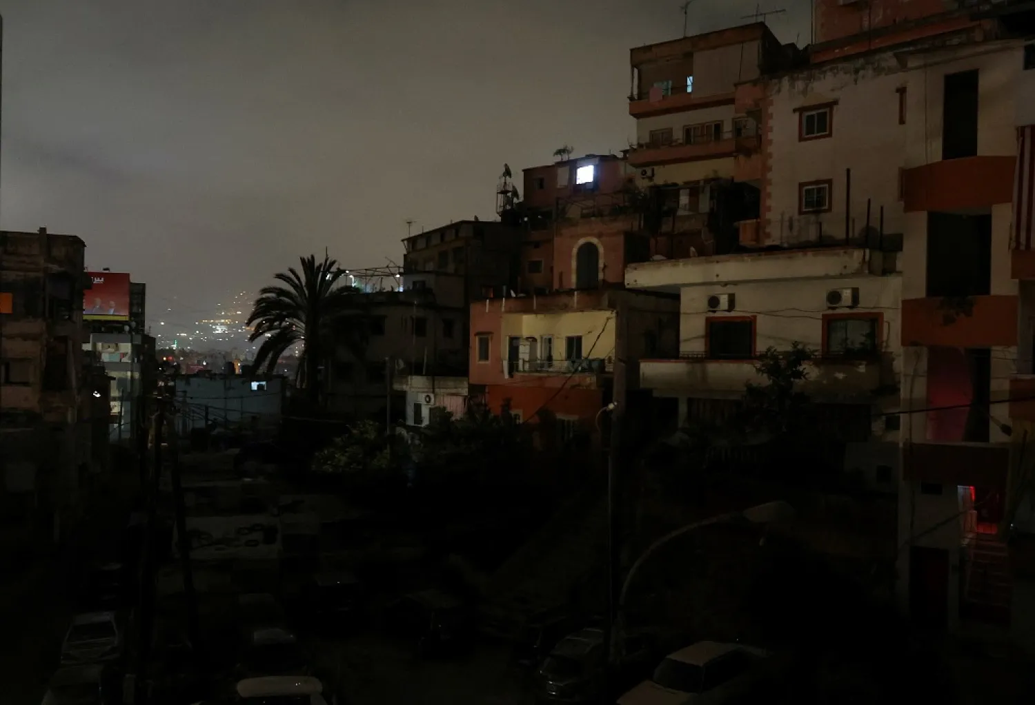 Residential buildings are pictured at night during a power cut in Beirut, Lebanon April 27, 2022. Picture taken April 27, 2022. (Reuters)