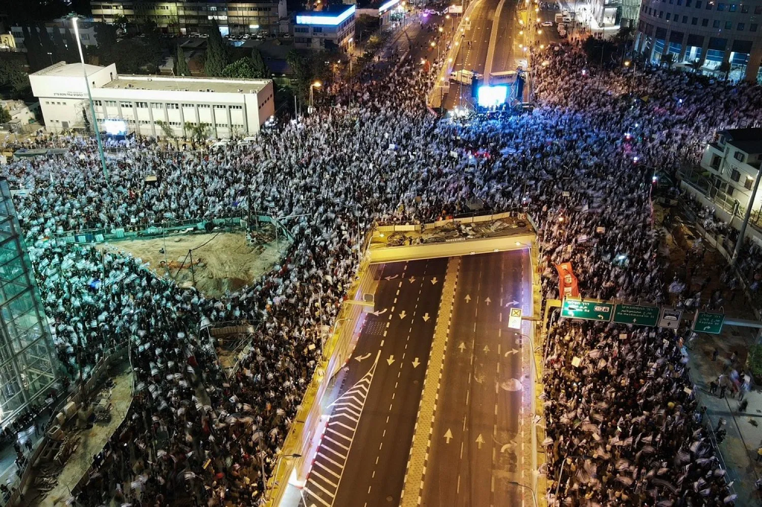 An aerial picture shows a protest against the Israeli government's controversial judicial reform bill in Tel Aviv on March 11, 2023. (AFP)