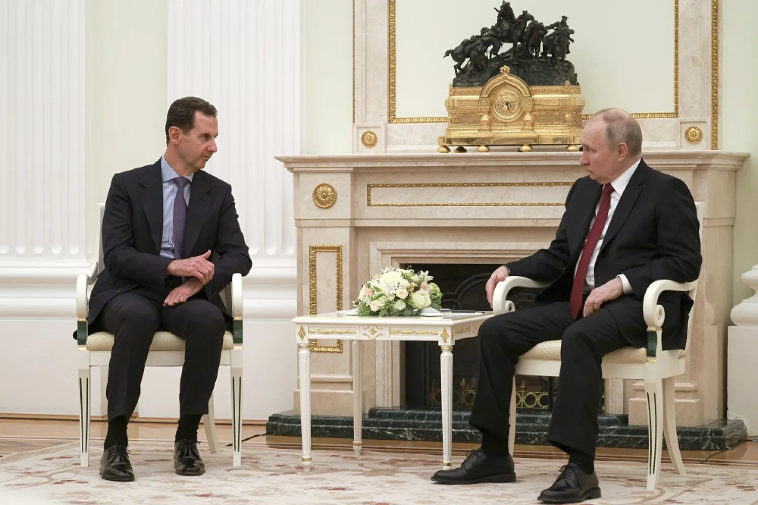 Russian President Vladimir Putin, right, listens to Syrian President Bashar al-Assad during their meeting at the Kremlin in Moscow, Russia, Wednesday, March 15, 2023. (AP) 