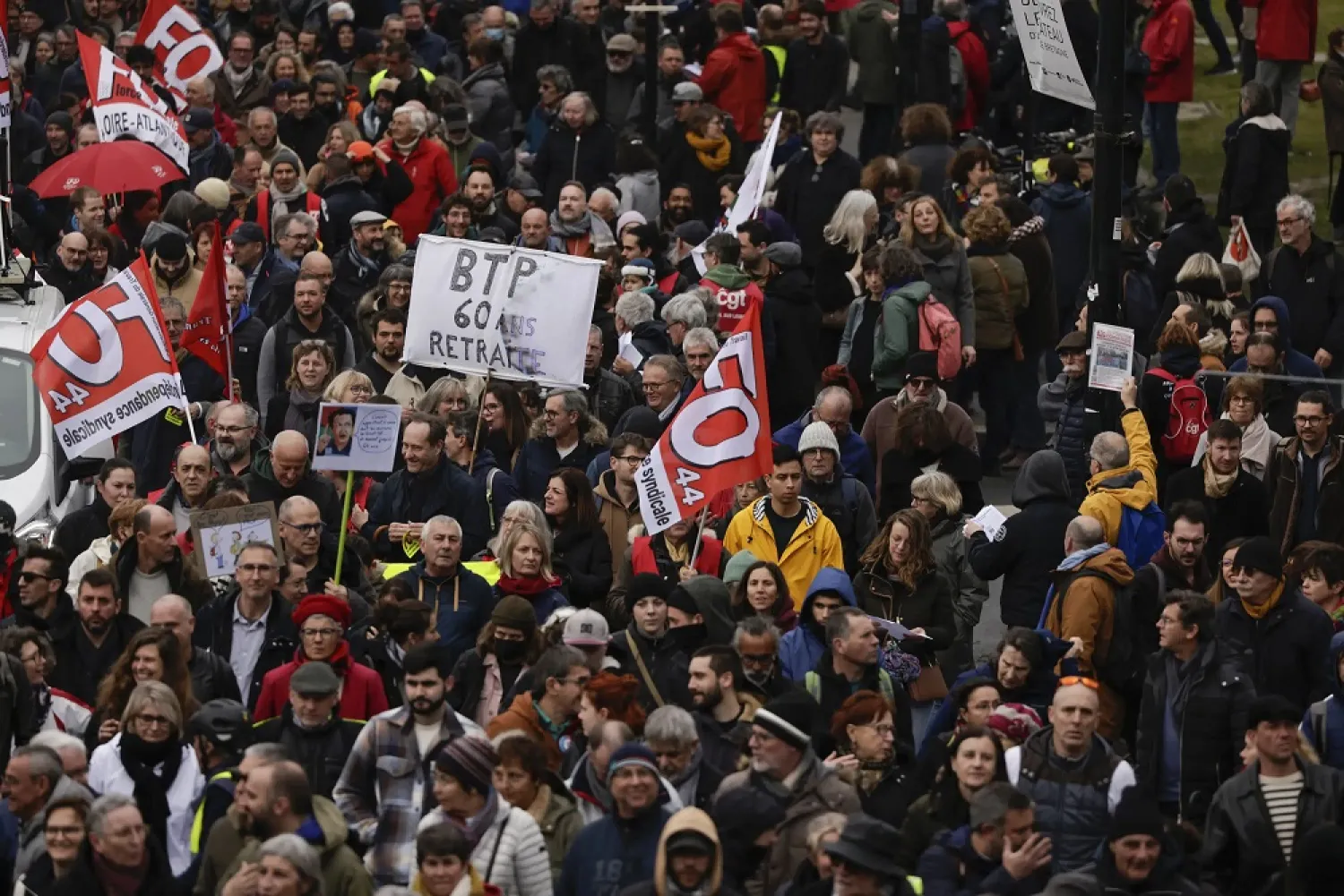 Protesters march during a demonstration in Nantes, western France, Saturday, March 11, 2023. (AP Photo/Jeremias Gonzalez)