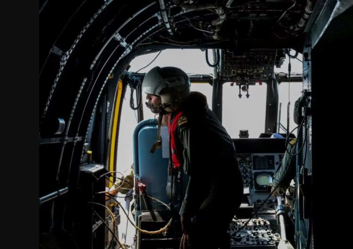 An Iranian Army helicopter crew member is seen during a joint naval military drill between Iran, Russia, and China in the Gulf of Oman, Iran, in this picture obtained on March 15, 2023. Iranian Army/WANA (West Asia News Agency)/Handout via REUTERS
