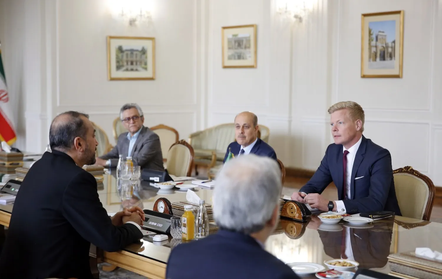 Iranian Foreign Minister Hossein Amir-Abdollahian (L) talks to Special Envoy of the Secretary-General for Yemen Hans Grundberg (R) at the Foreign Ministry office in Tehran, Iran, 13 March 2023. (EPA)
