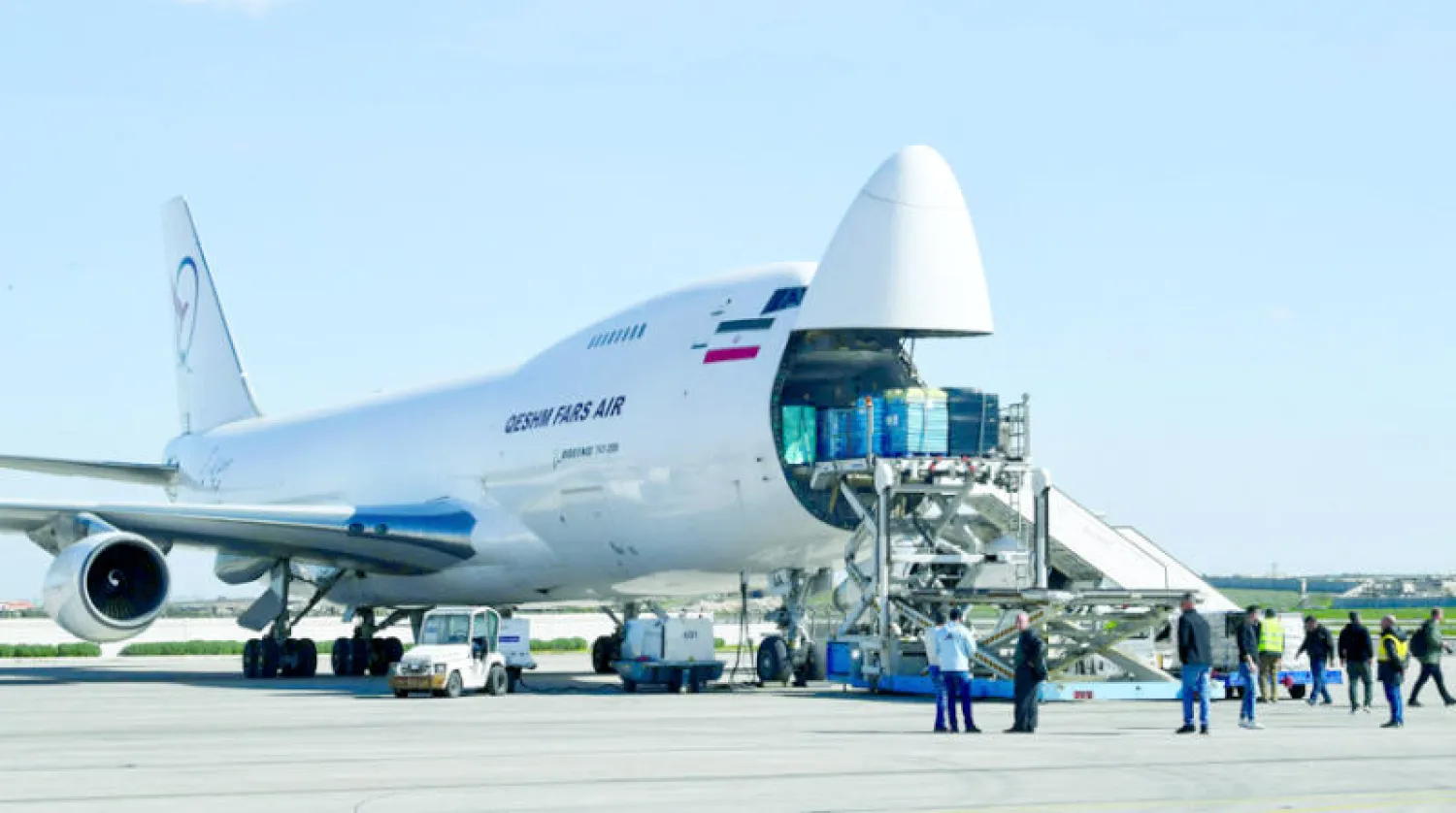 طائرة إيرانية في مطار حلب الدولي يوم 11 مارس الحالي (أ.ف.ب)