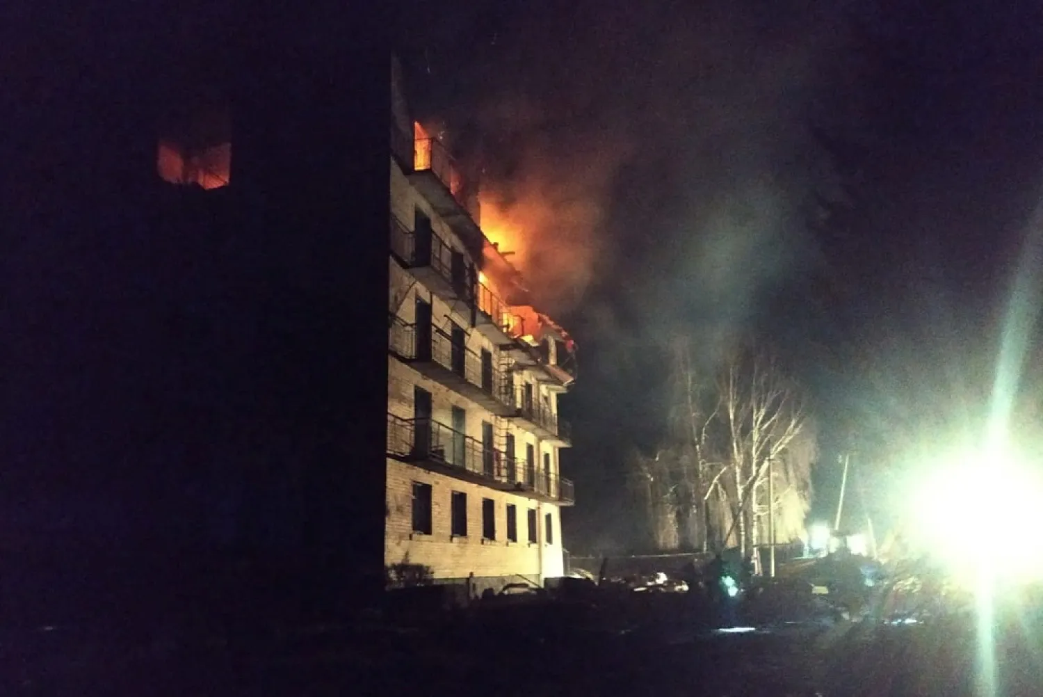 Smoke billows from a building heavily damaged by a Russian drone strikes, amid Russia's attack on Ukraine, in the town of Rzhyshchiv, in Kyiv region, Ukraine March 22, 2023. (Press service of the State Emergency Service of Ukraine/Handout via Reuters)