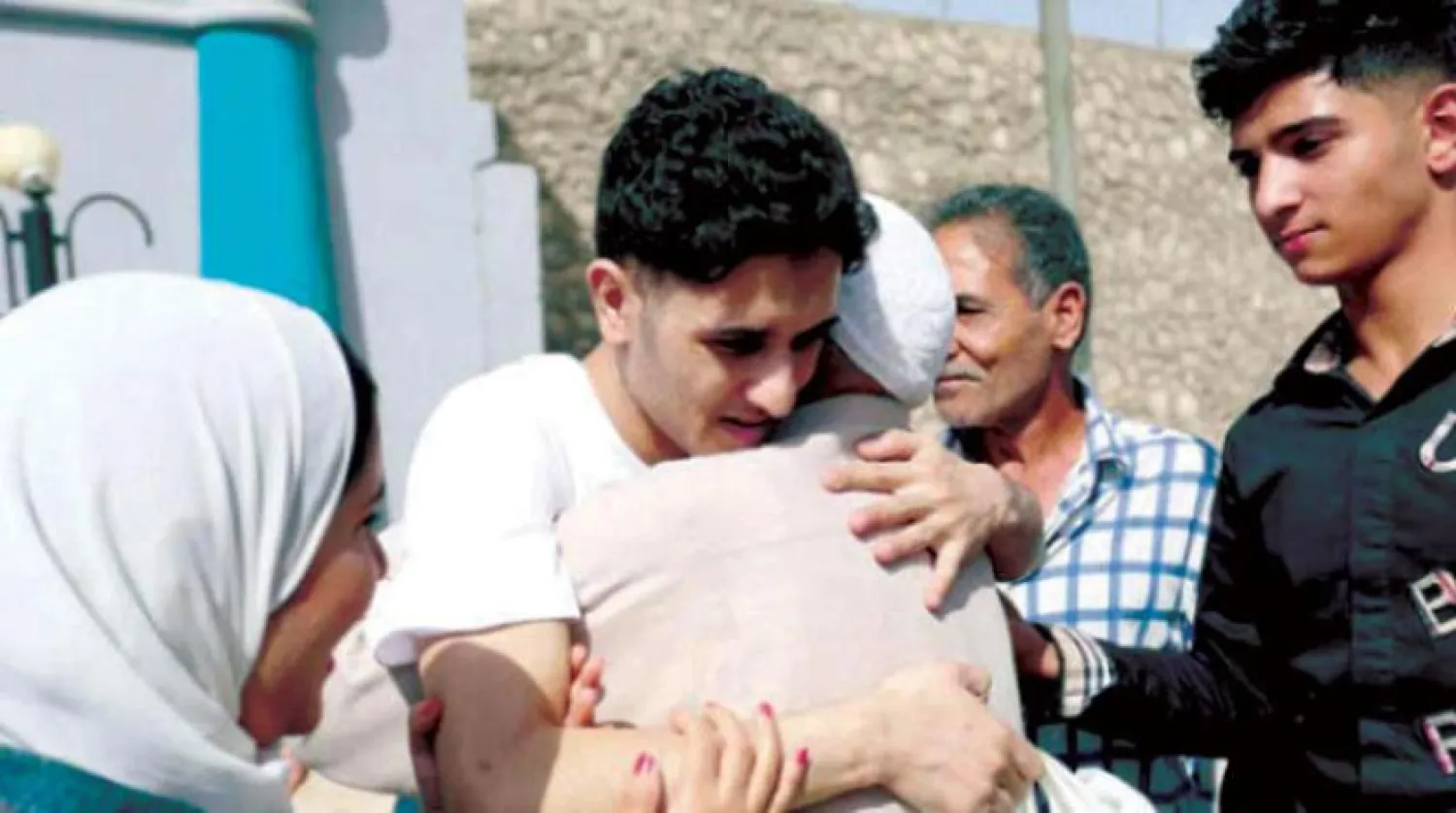 Previously released detainees seen in this photo released by the Presidential Pardon Committee.
