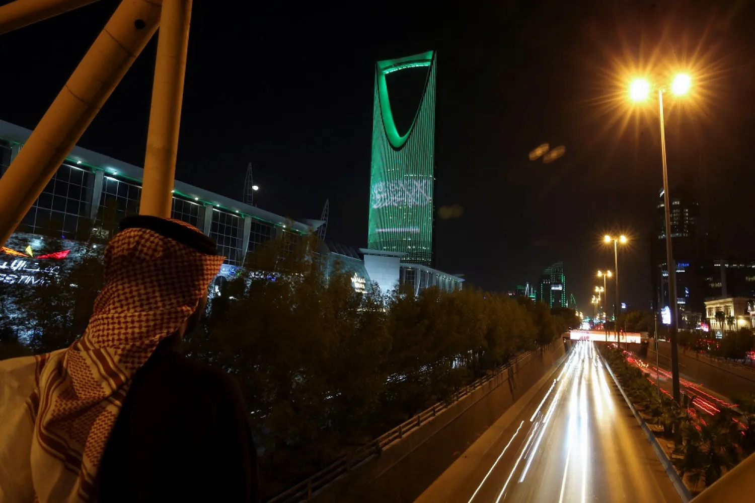 The Flag of Saudi Arabia is displayed on the Kingdom Center as Saudi celebrates Flag Day, in Riyadh, Saudi Arabia, March 11, 2023. (Reuters)