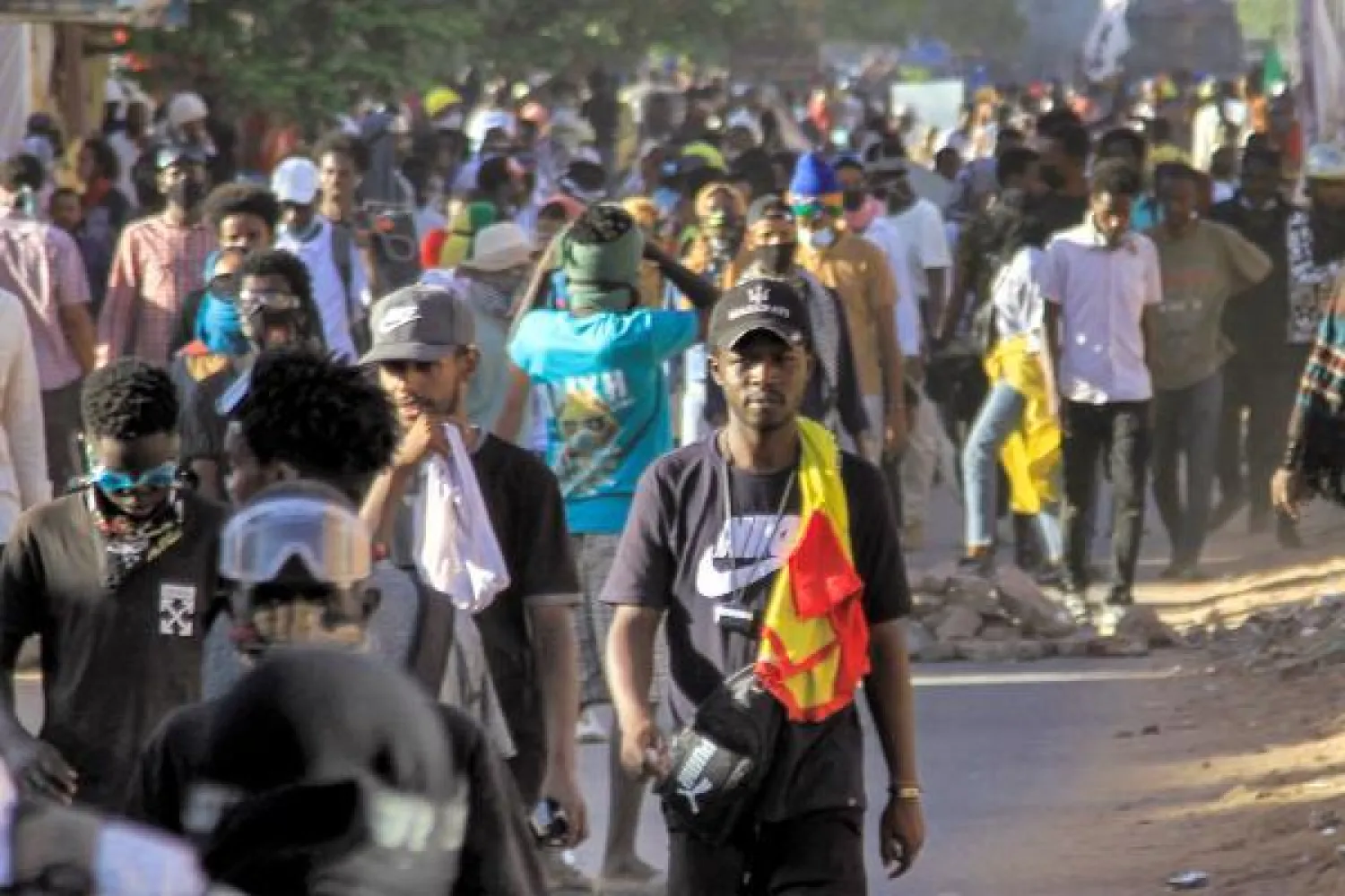 من إحدى المظاهرات المناهضة للحكومة السودانية شمال الخرطوم في 14 مارس الحالي (أ.ف.ب)