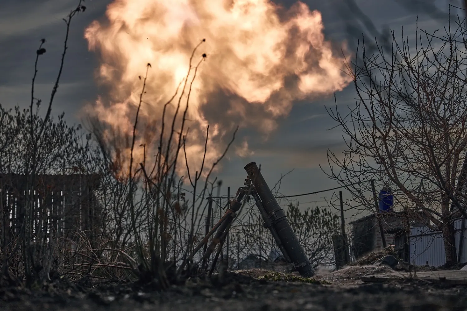 Ukrainian soldiers fire a mortar at Russian positions on the frontline near Bakhmut, Donetsk region, Ukraine, Saturday, March 25, 2023. (AP)