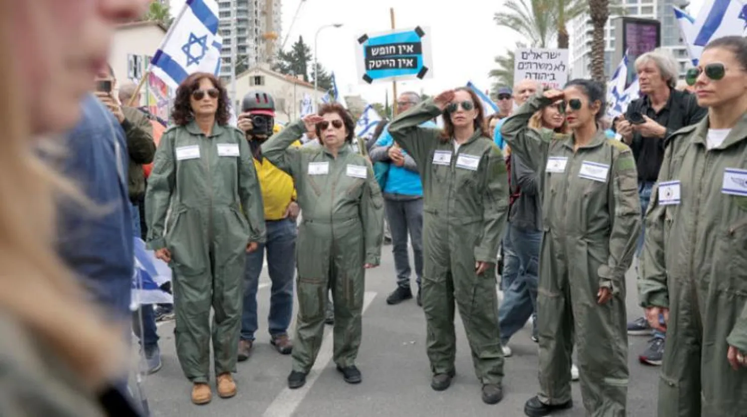 Israeli protesters in air force uniforms during a demonstration against the government in Tel Aviv last Thursday (EPA)
