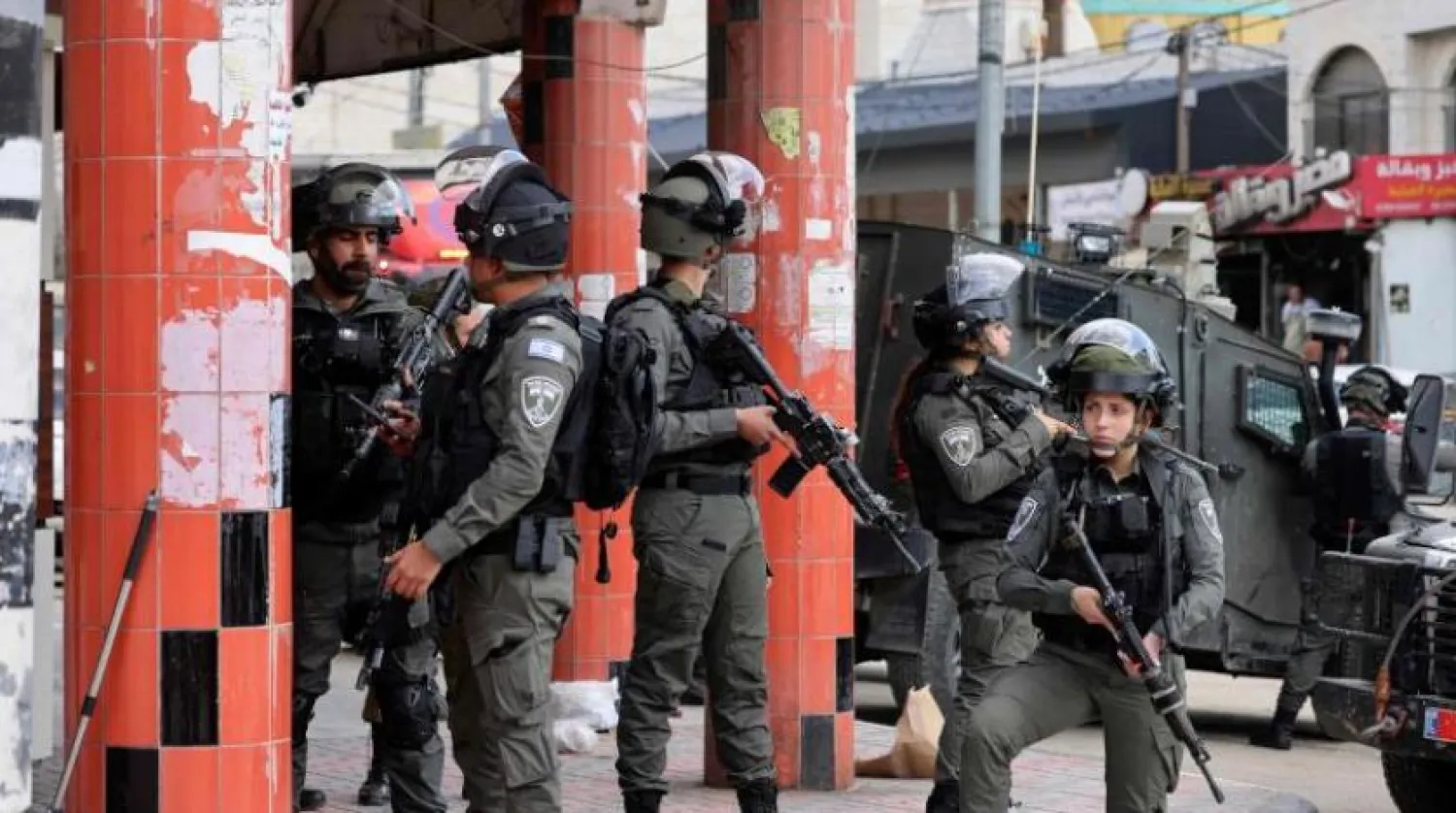 İsrail askerleri Batı Şeria'da (AFP)
