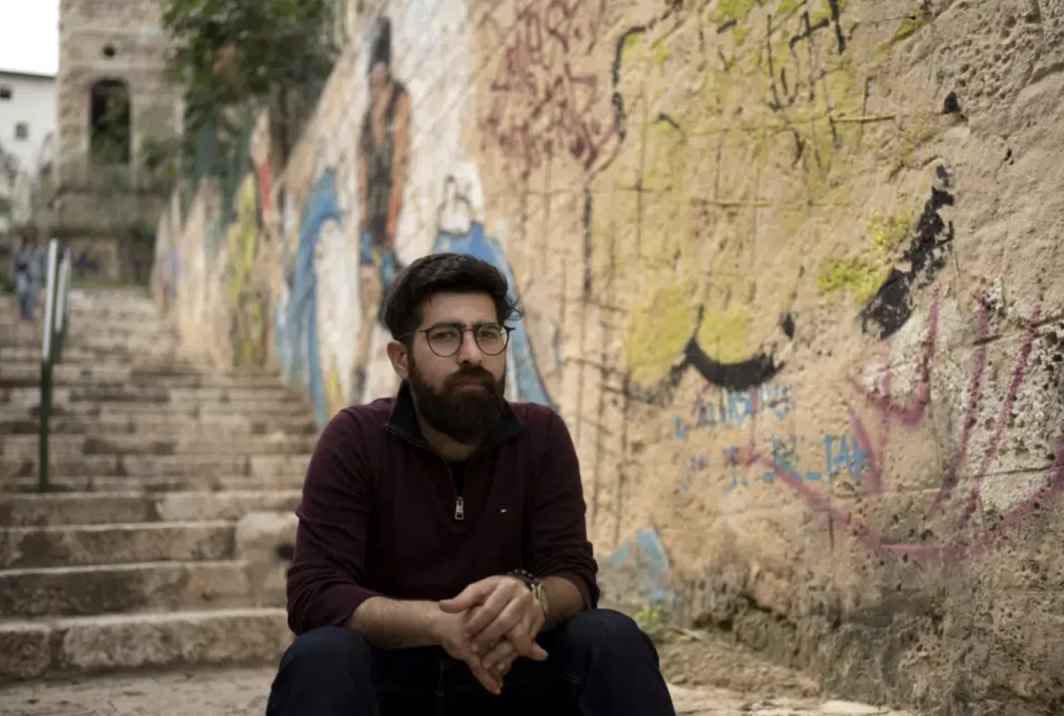 Lawyer Amal Oraby poses for a portrait in Wadi Salib, a Palestinian area of Haifa, Israel where residents were forced to flee during the 1948 Arab-Israeli war, Wednesday, March 22, 2023.  (AP Photo/Maya Alleruzzo)
