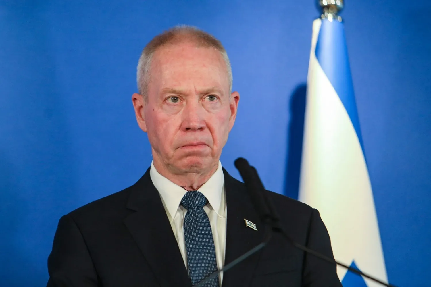 In this file photo taken on March 9, 2023, Israeli Minister of Defense Yoav Gallant delivers a statement to the press at the Israel Aerospace Industries (IAI) headquarters near the Ben Gurion airport. (AFP)