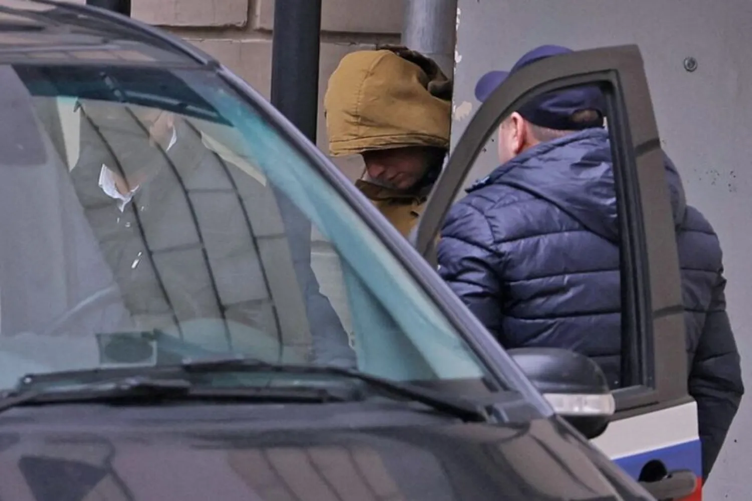 Reporter for US newspaper The Wall Street Journal Evan Gershkovich, detained on suspicion of espionage, leaves a court building in Moscow, Russia March 30, 2023. REUTERS/Evgenia NovozheninaREUTERS