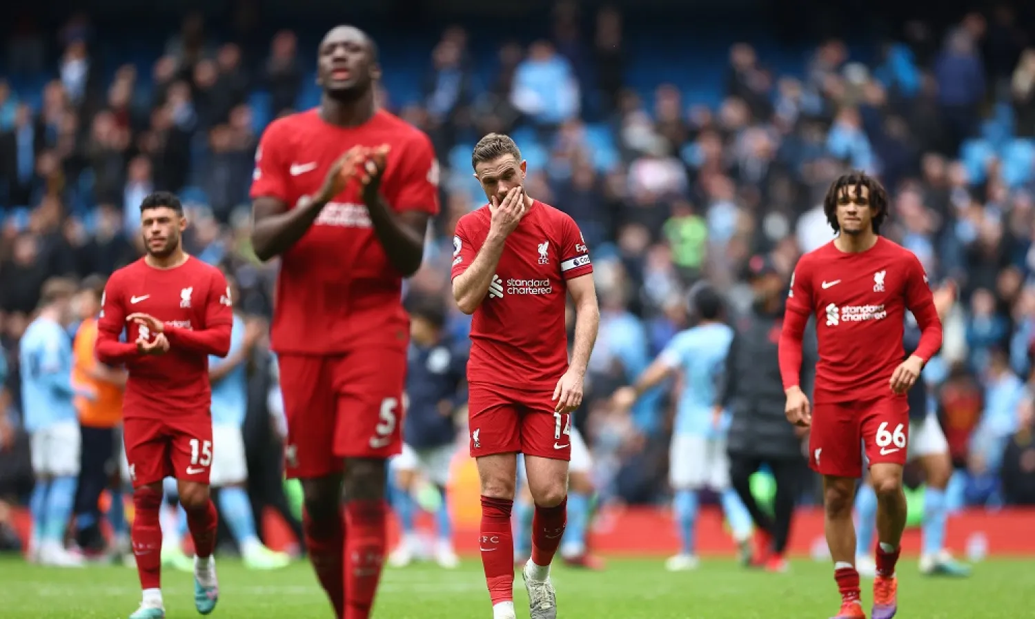 Football - Premier League - Manchester City v Liverpool - Etihad Stadium, Manchester, Britain - April 1, 2023 Liverpool's Trent Alexander-Arnold and Jordan Henderson look dejected after the match. (Reuters)